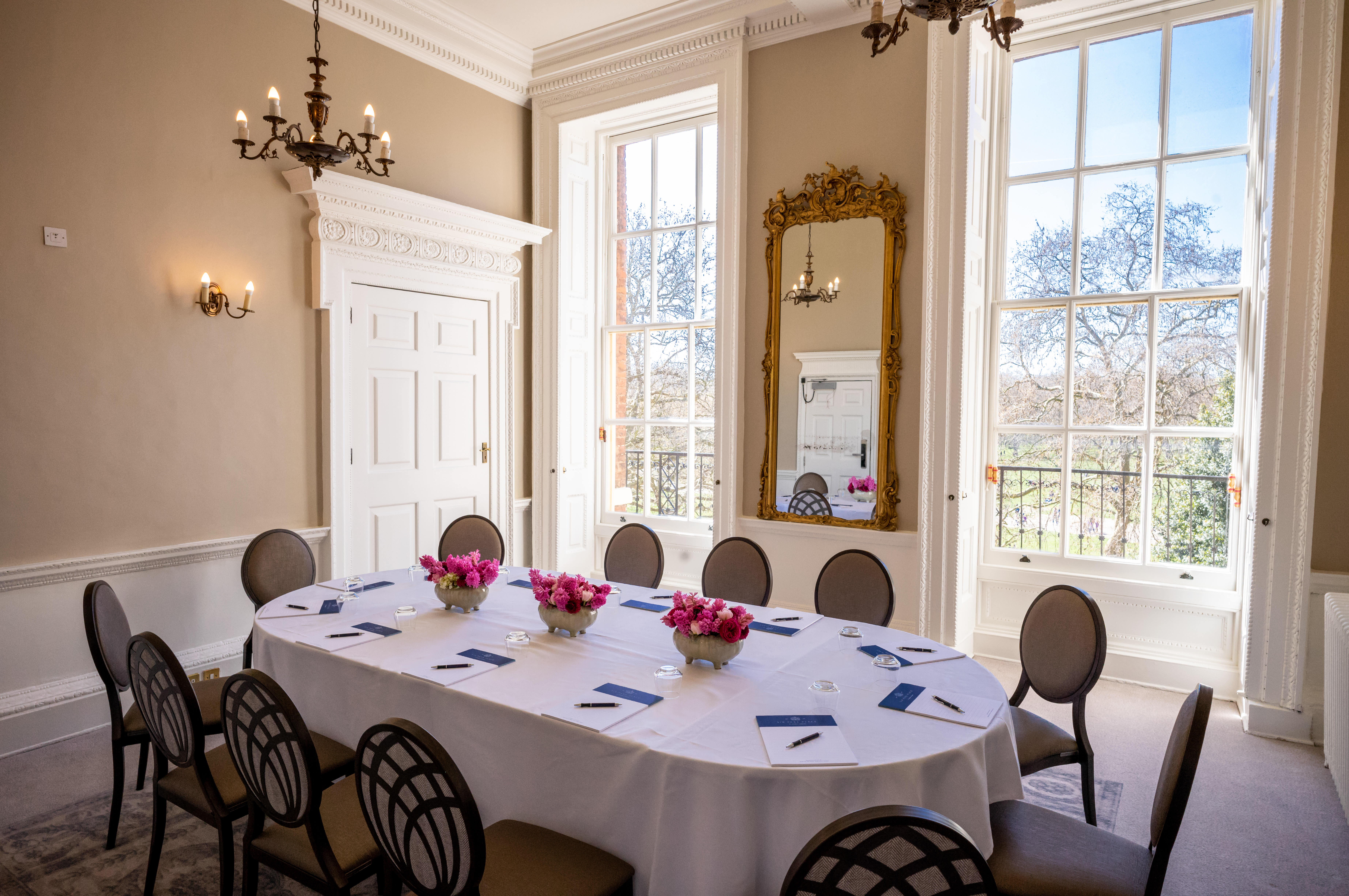 Bennet-Clark Room with oval table, perfect for corporate meetings and intimate gatherings.
