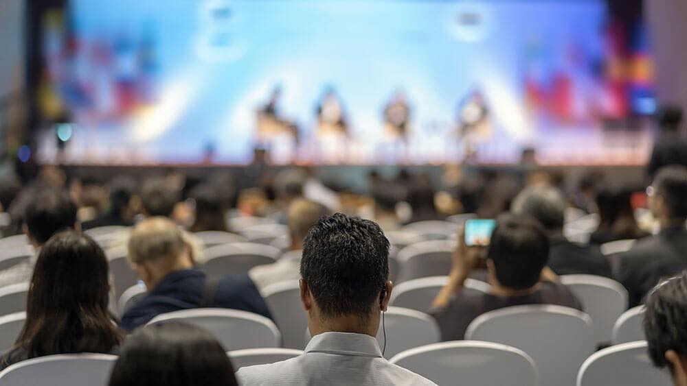 Port of Liverpool Suite conference with engaged audience at panel discussion.