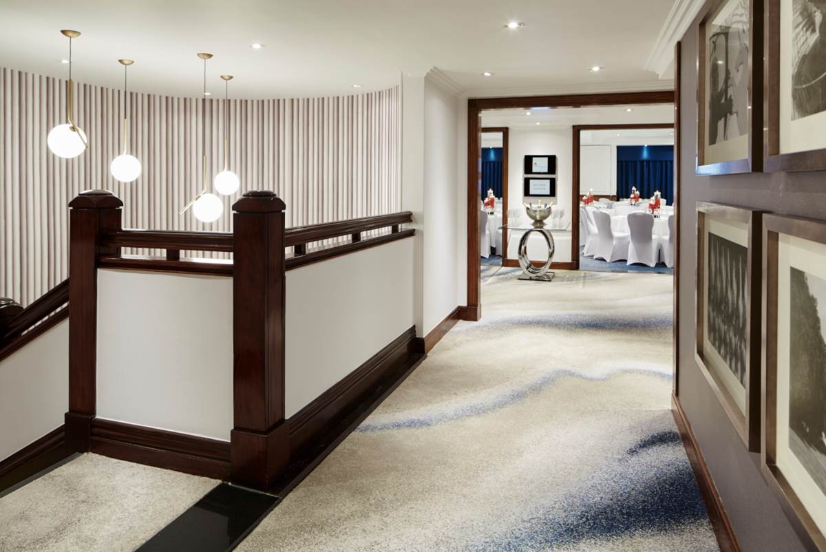 Westmacott Suite corridor at London Marriott, elegant decor for meetings and events.