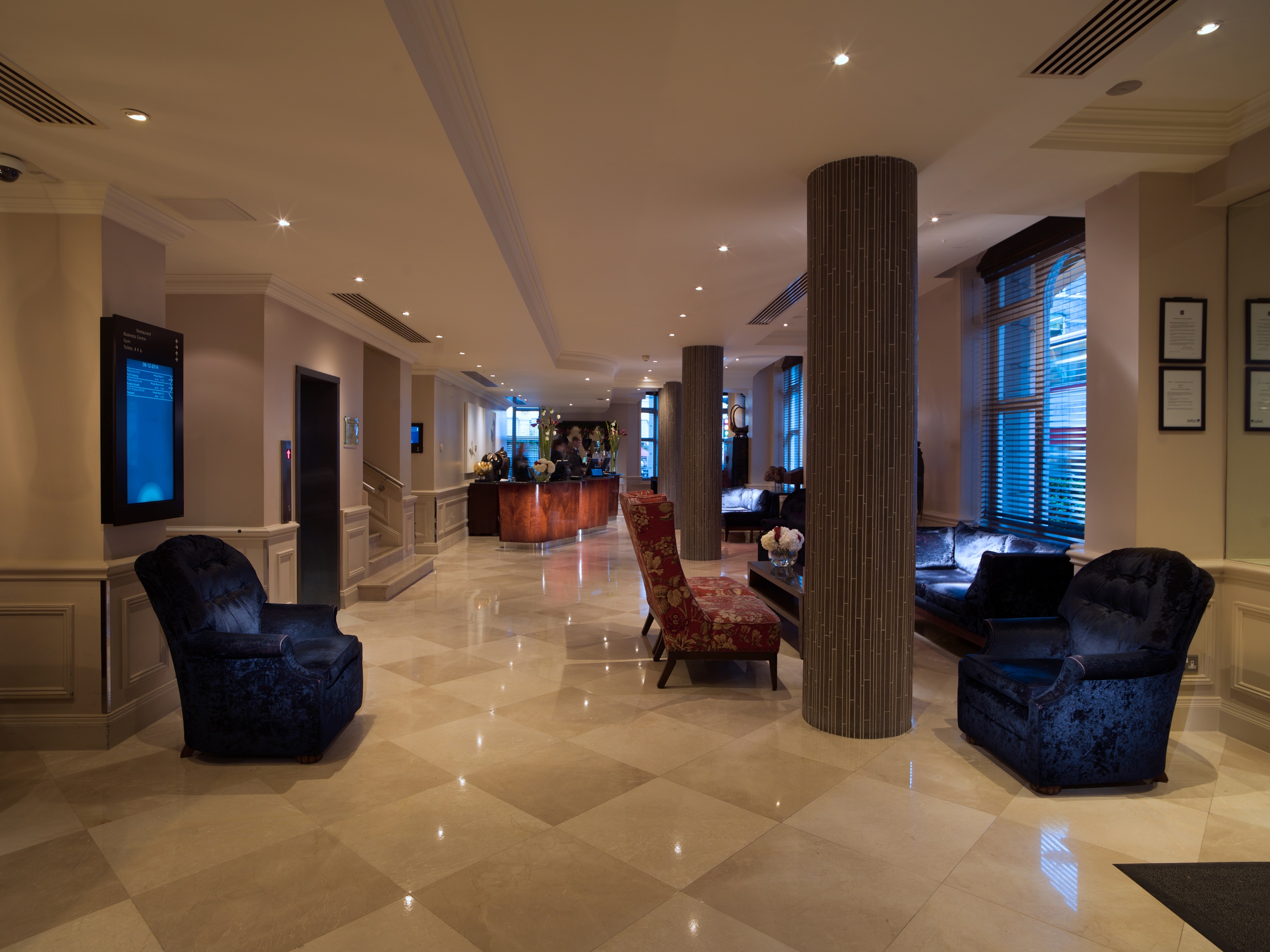 Private Room 14 at Radisson Blu, elegant lobby for meetings and events in London.