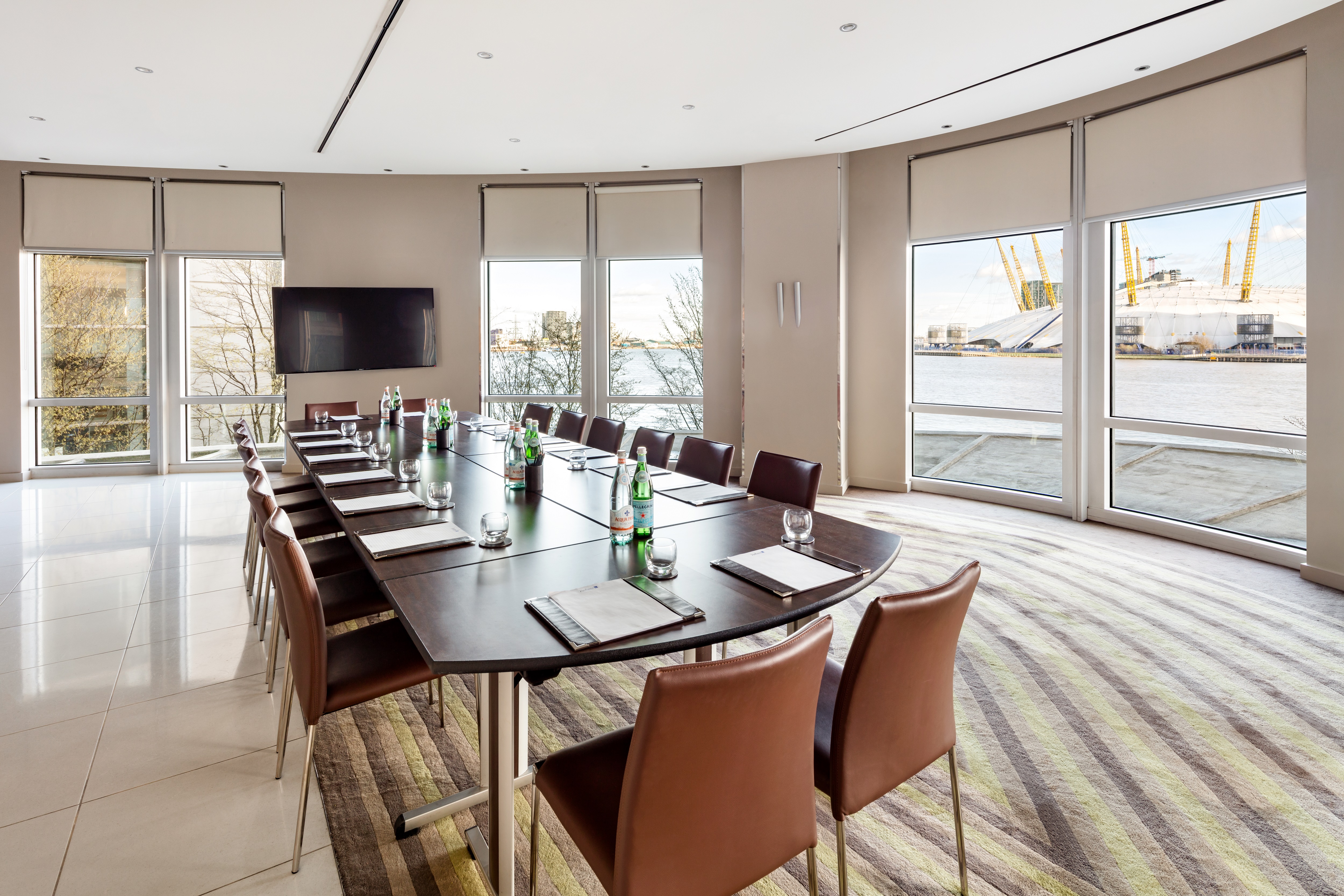Modern meeting room with elegant table at Radisson Blu Edwardian, ideal for corporate events.