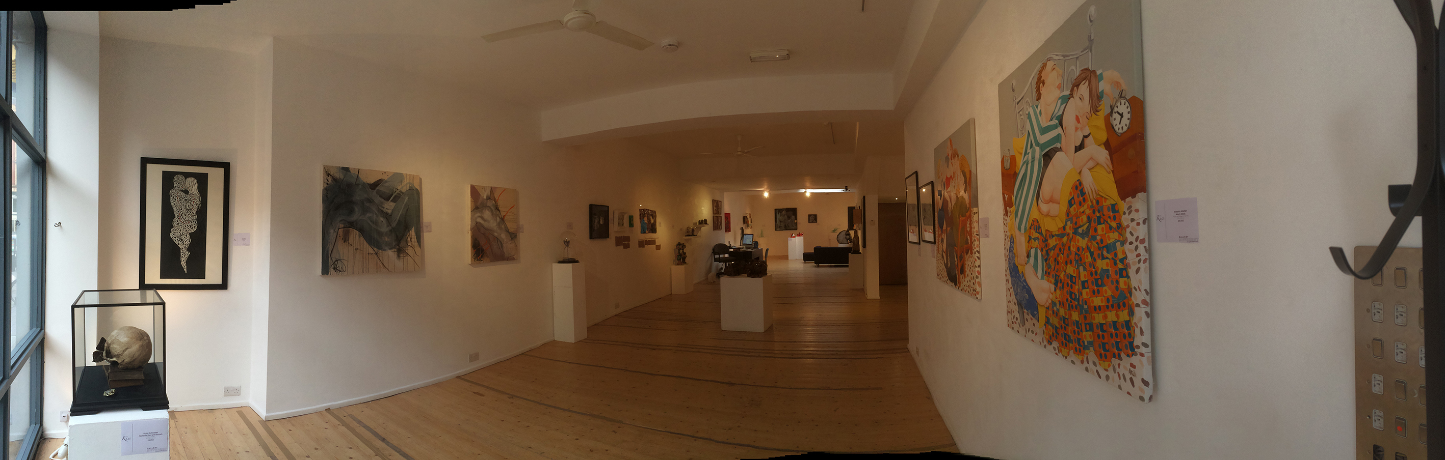 Spacious art gallery with natural light, ideal for exhibitions and networking events.