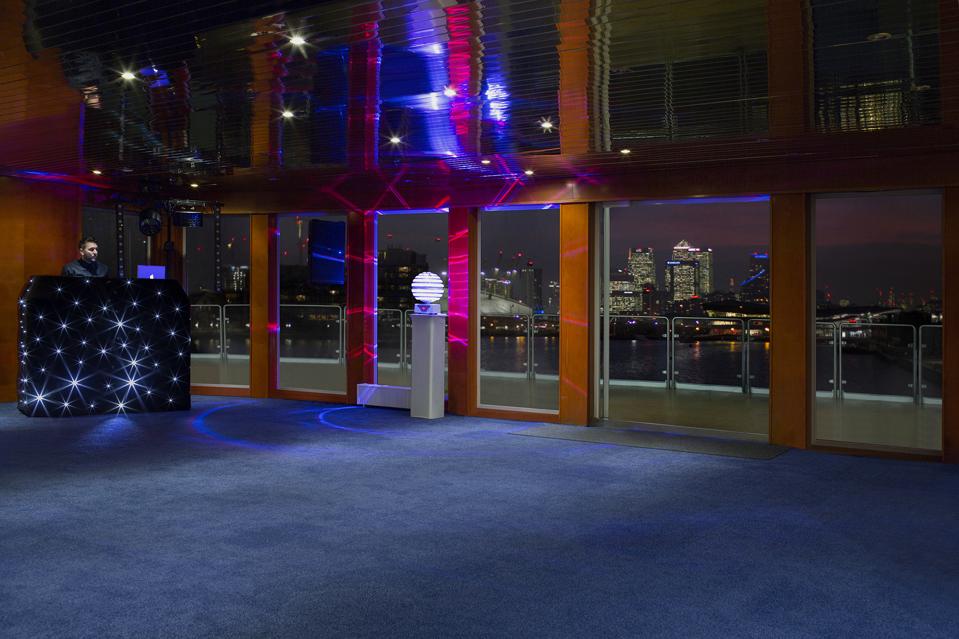 Exclusive Hire event space in Sunborn London Yacht Hotel with DJ setup and city views.