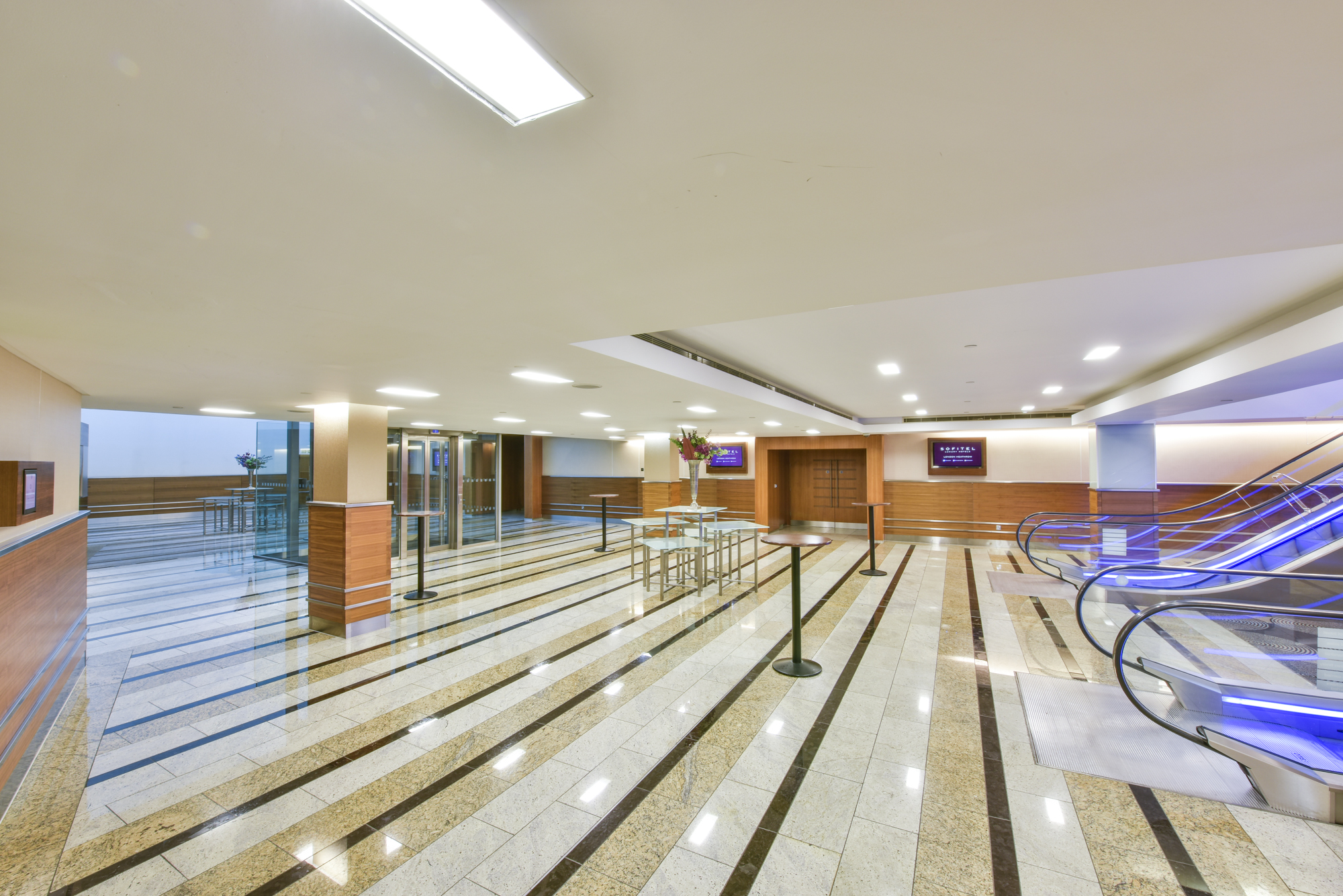 Arora Ballroom lobby at Sofitel London Heathrow, spacious with polished marble floors, event venue.