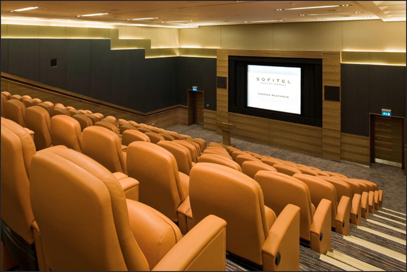 Arora Theatre at Sofitel London Heathrow, modern auditorium for conferences and screenings.
