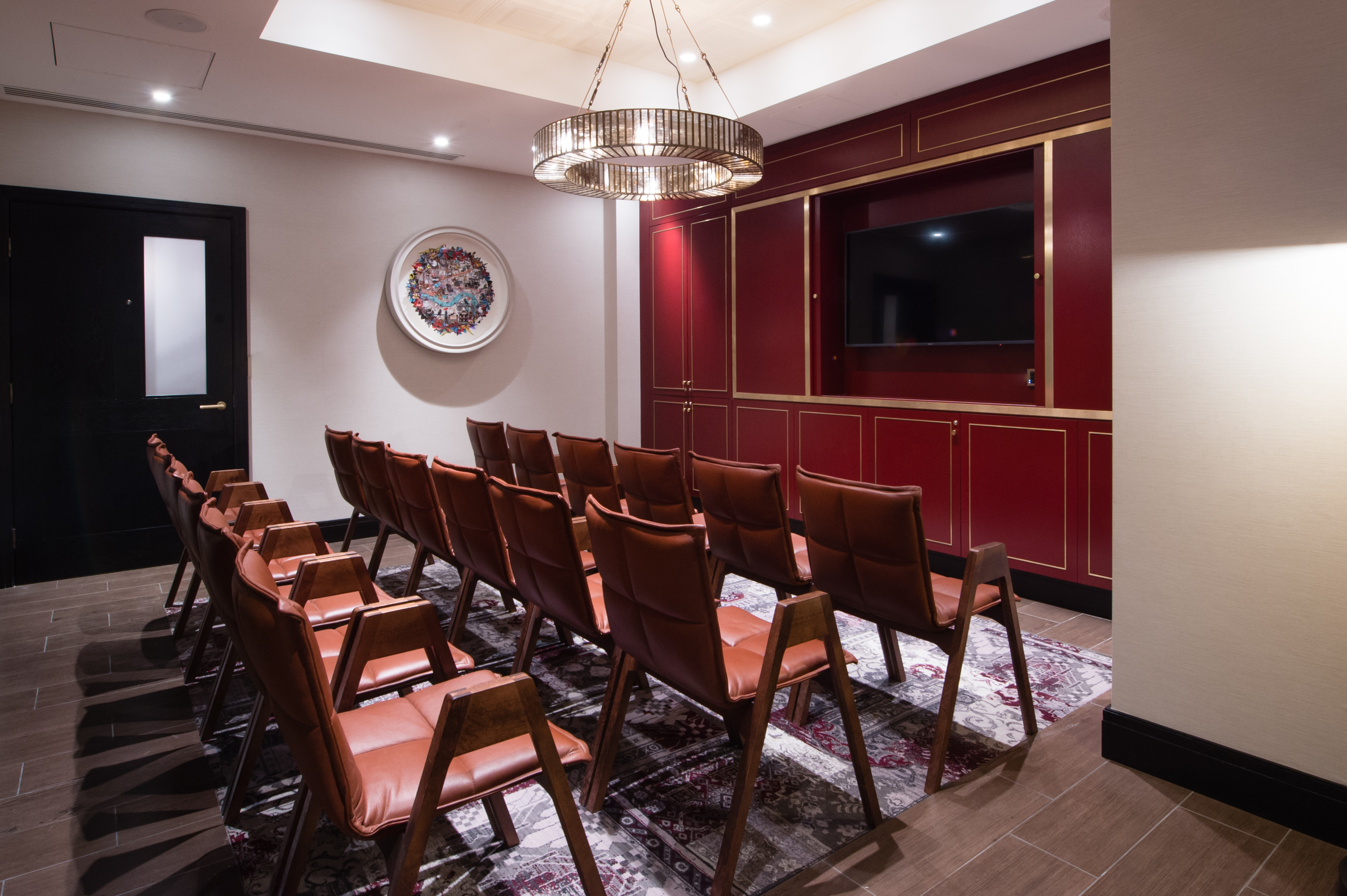 Elegant meeting room with leather chairs for workshops at Vintry and Mercer Hotel.