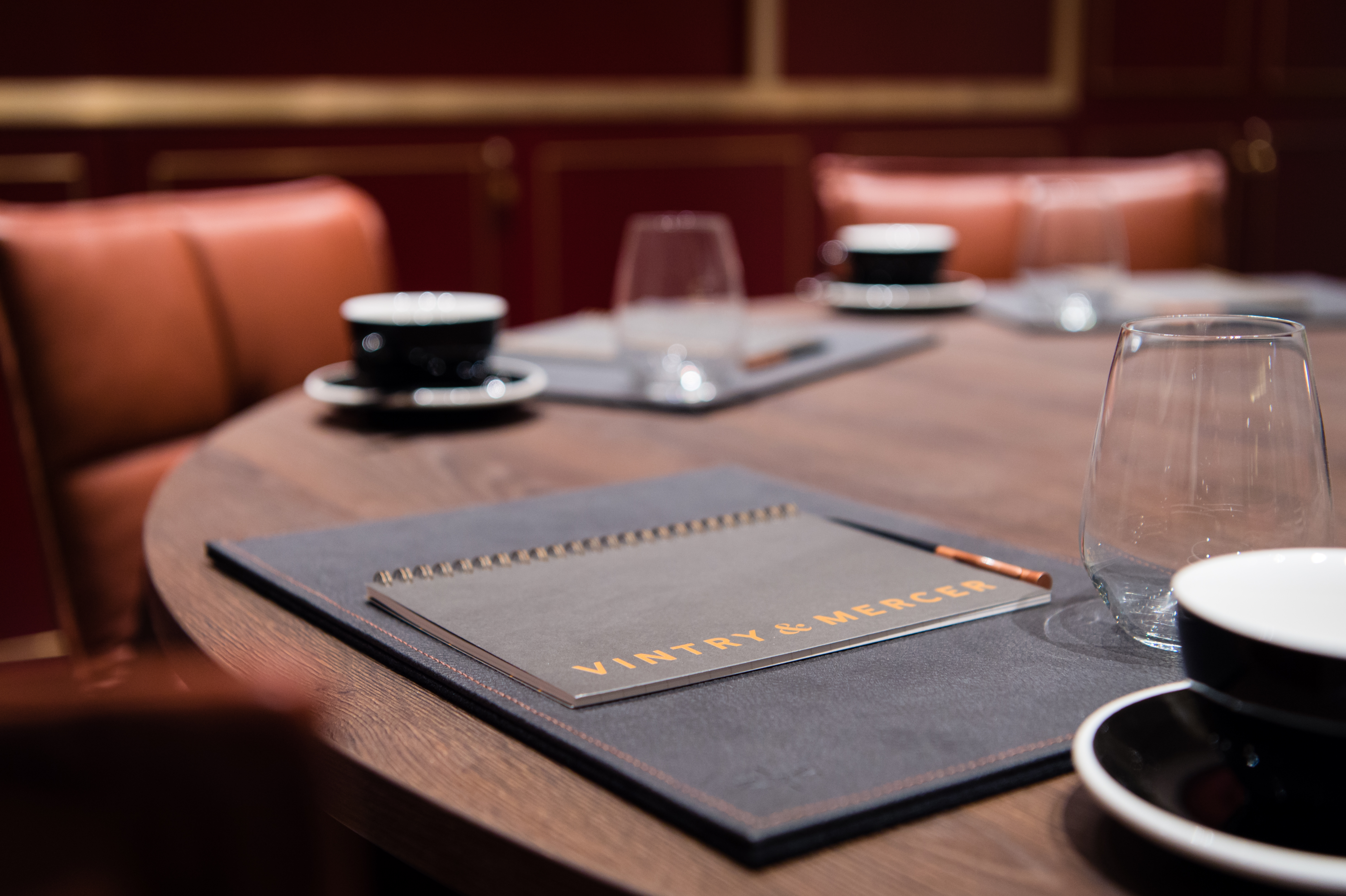 Elegant meeting room with polished table, ideal for corporate events and presentations.