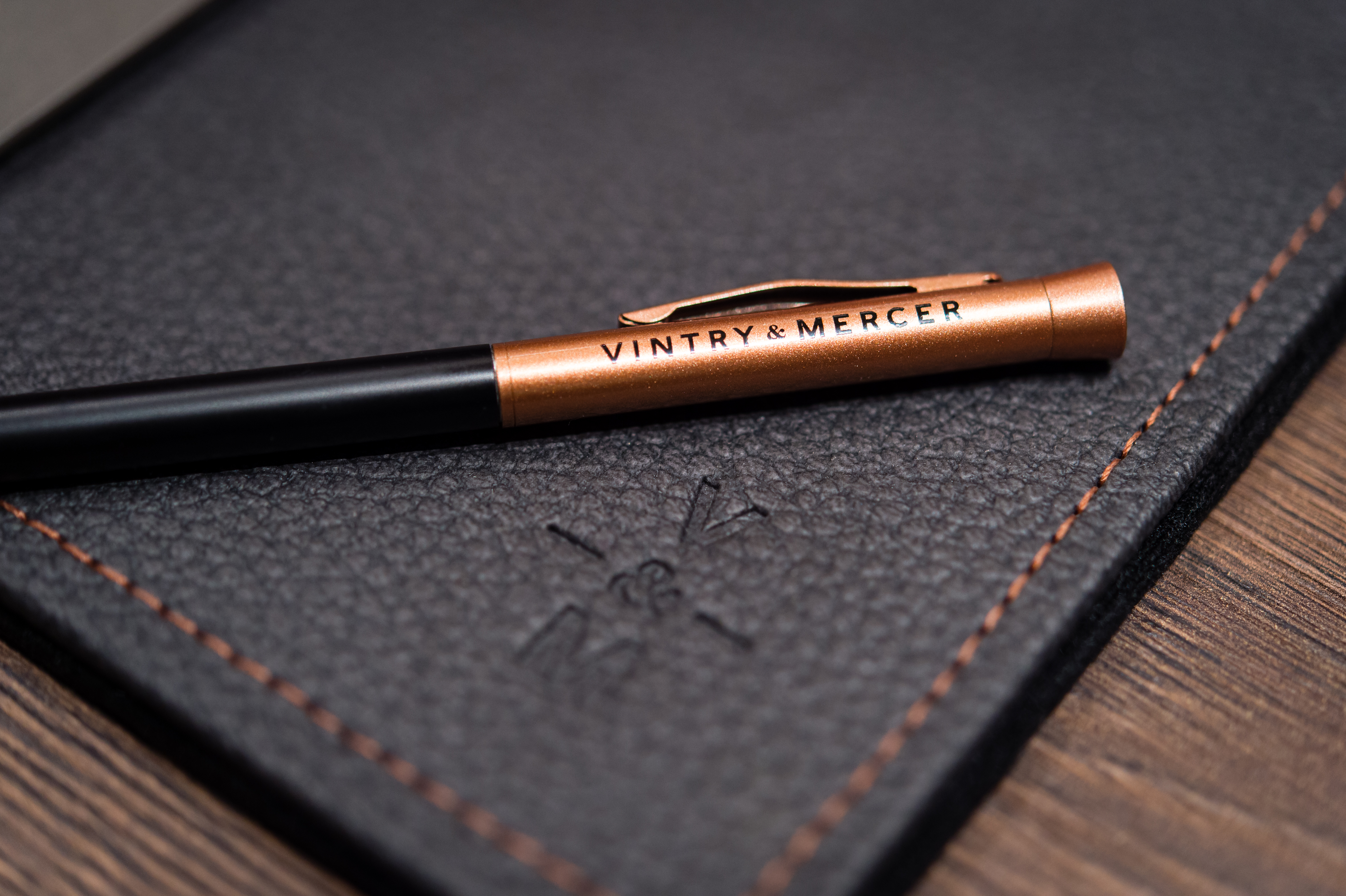 Sleek pen on leather notebook at Vintry and Mercer Hotel corporate event.