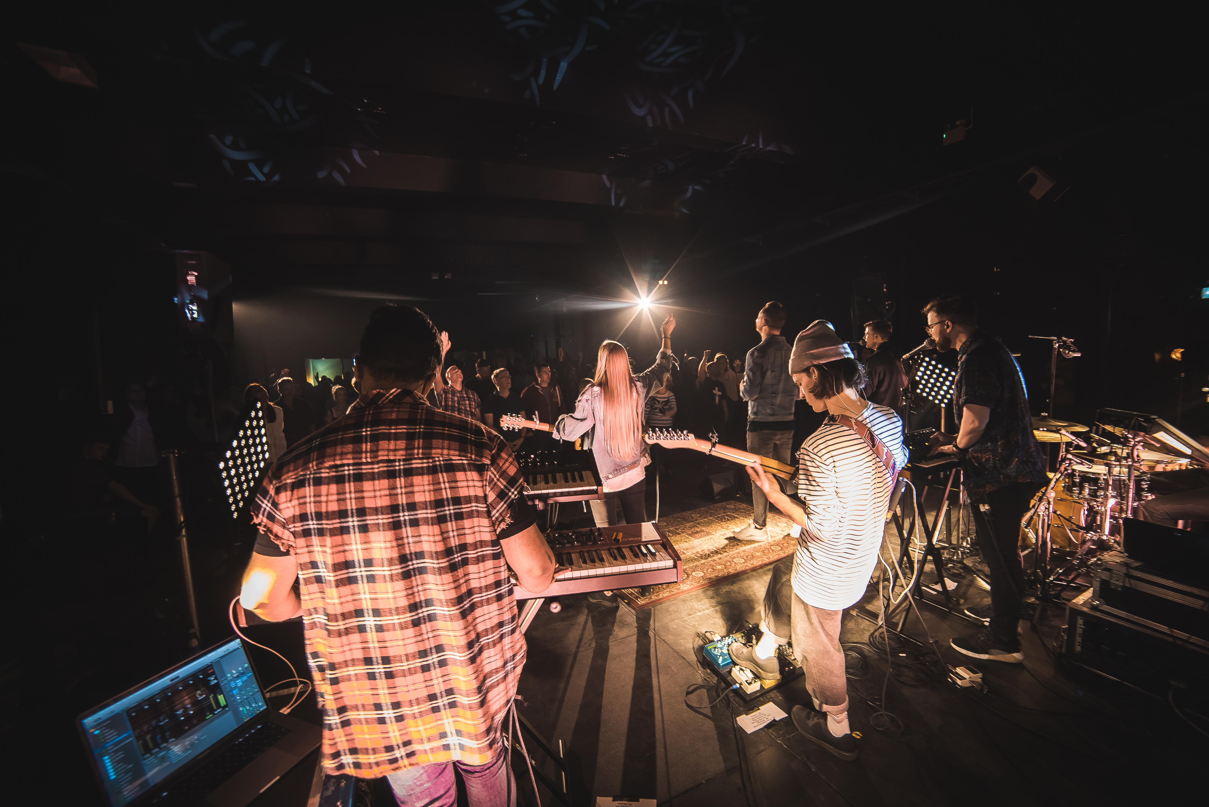 Eclipse Theatre performance with diverse band, engaging atmosphere for events and meetings.