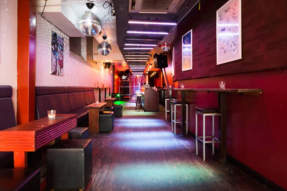 Stylish event space in Trafik with vibrant lighting, perfect for cocktail parties and networking.