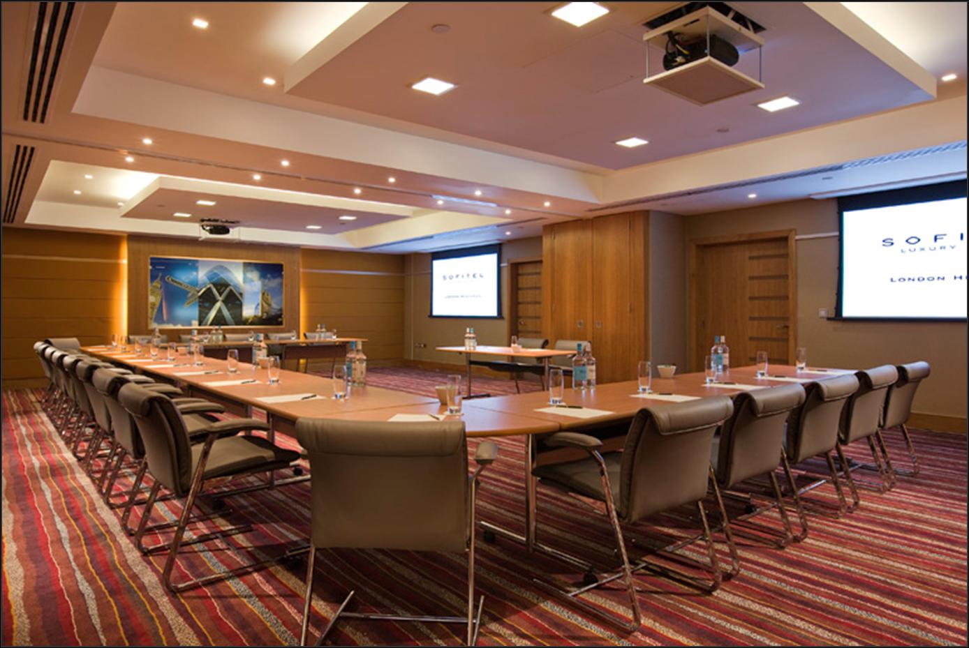 London Suite at Sofitel Heathrow: U-shaped meeting room for professional gatherings.