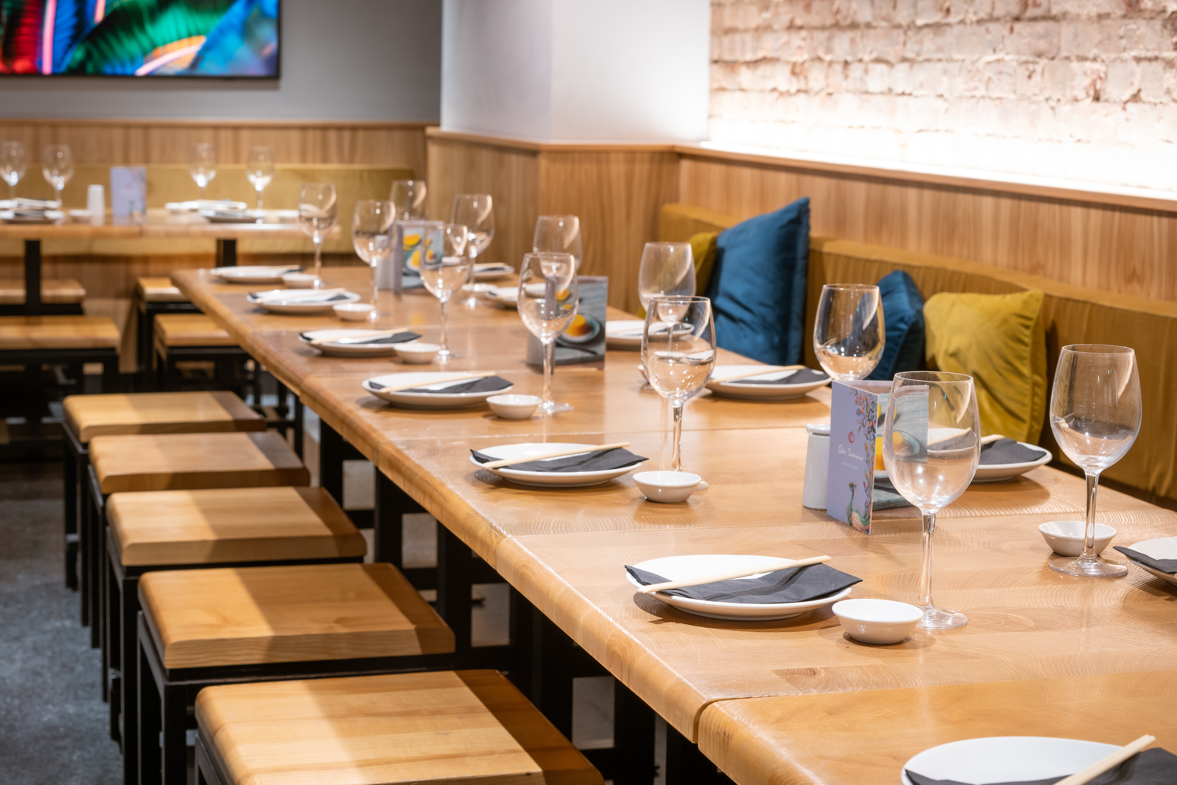 Group dining table at Ping Pong St Christopher Place, perfect for corporate events and gatherings.