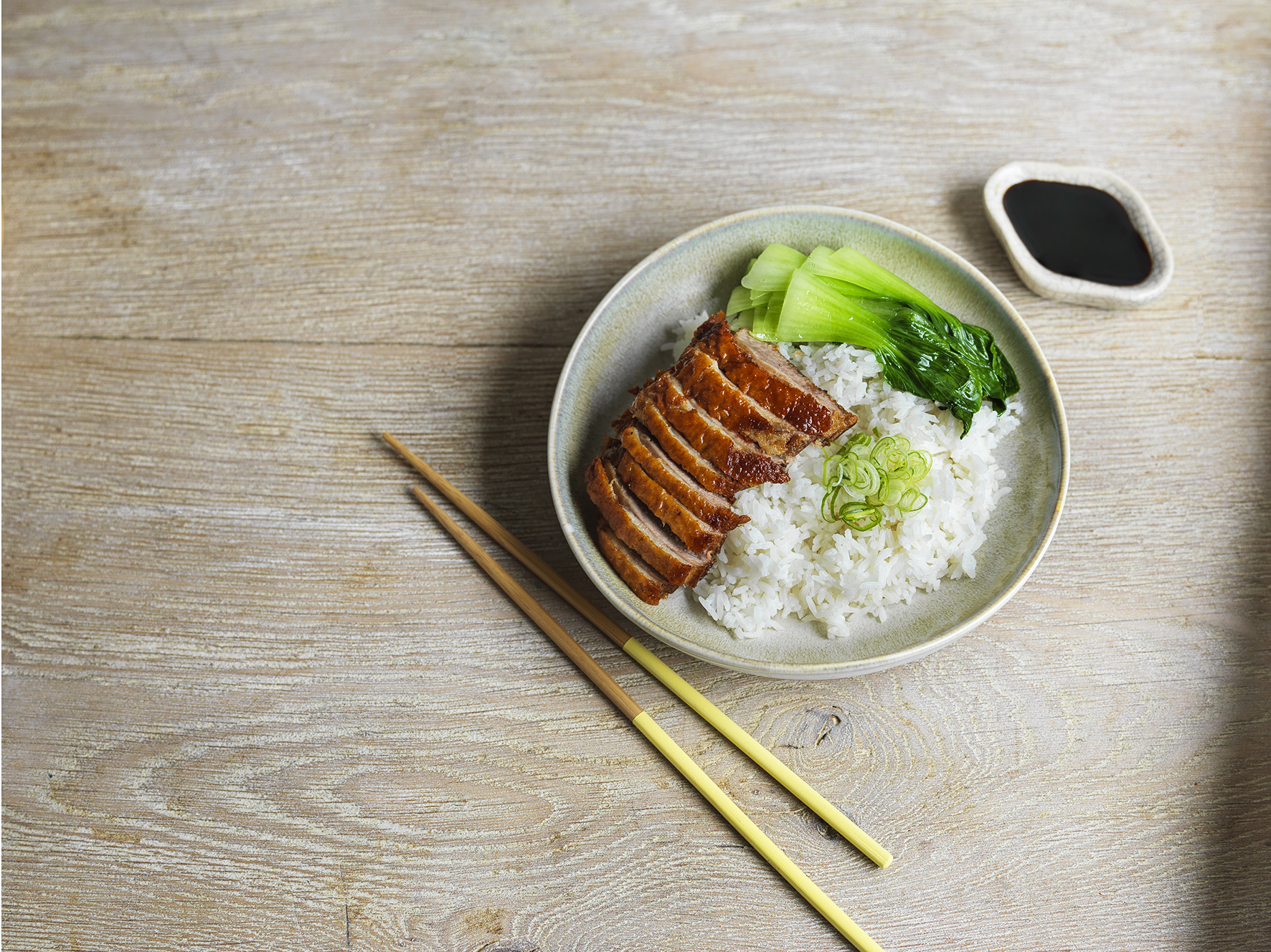Grilled chicken dish with rice and bok choy at Ping Pong St Christopher Place event.