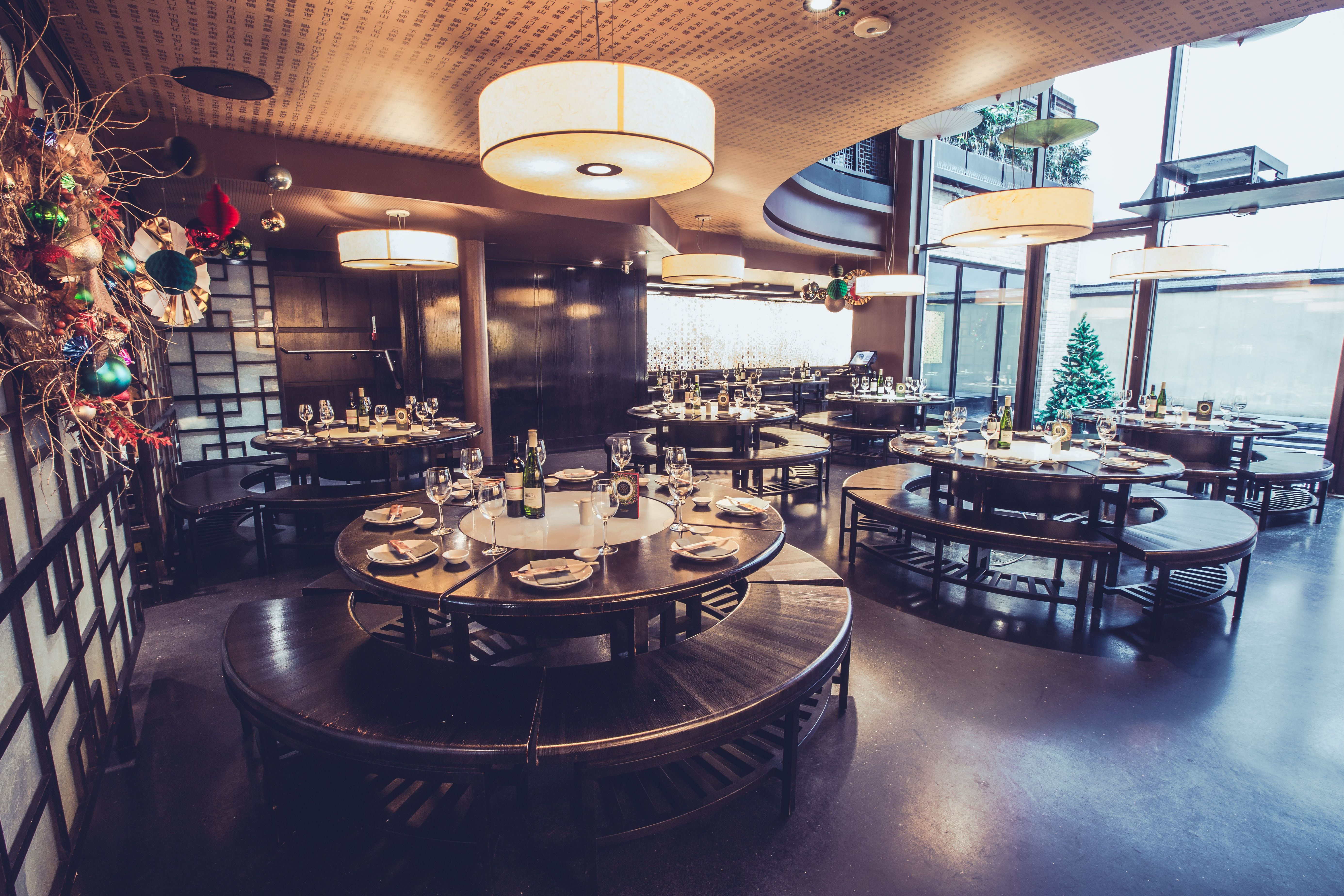 Group bookings at Ping Pong Soho with circular tables for corporate events and celebrations.