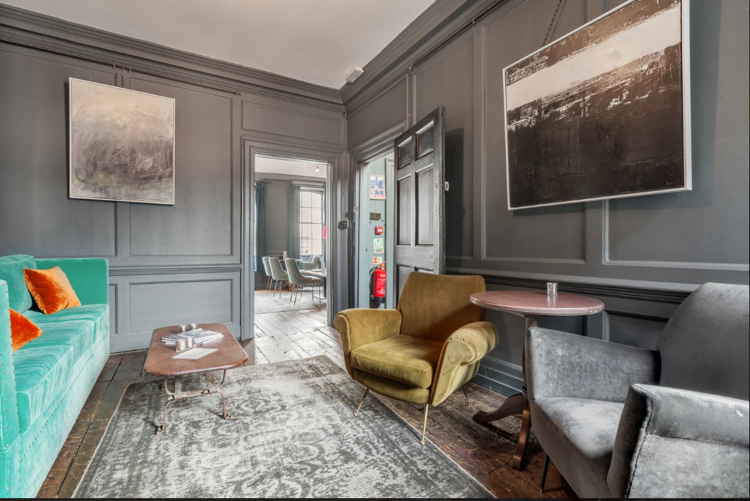 Stylish meeting space in Blacks with cozy decor for gatherings and brainstorming sessions.