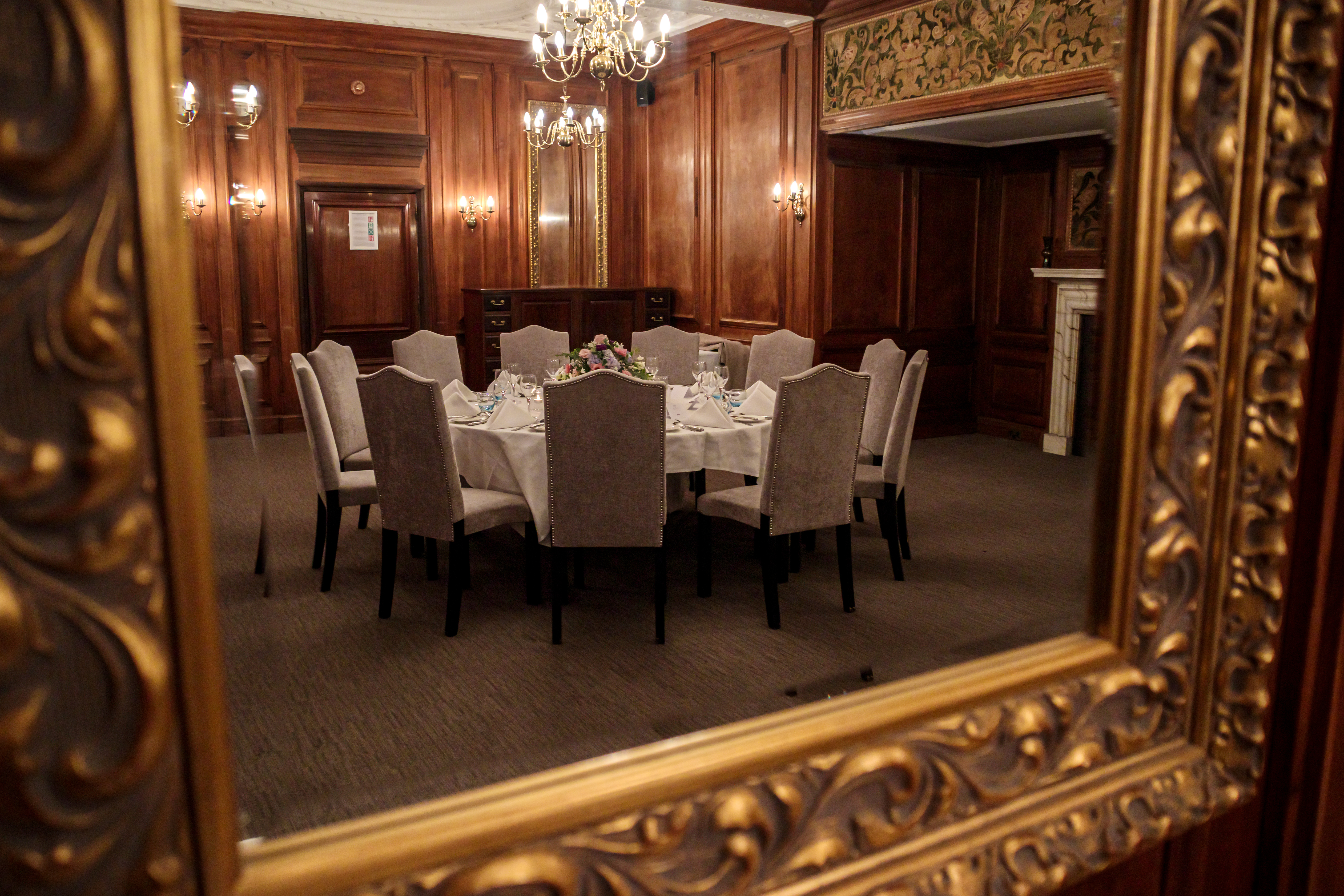 Elegant dining table in Barnett Hill Hotel's Drawing Room for luxury events.