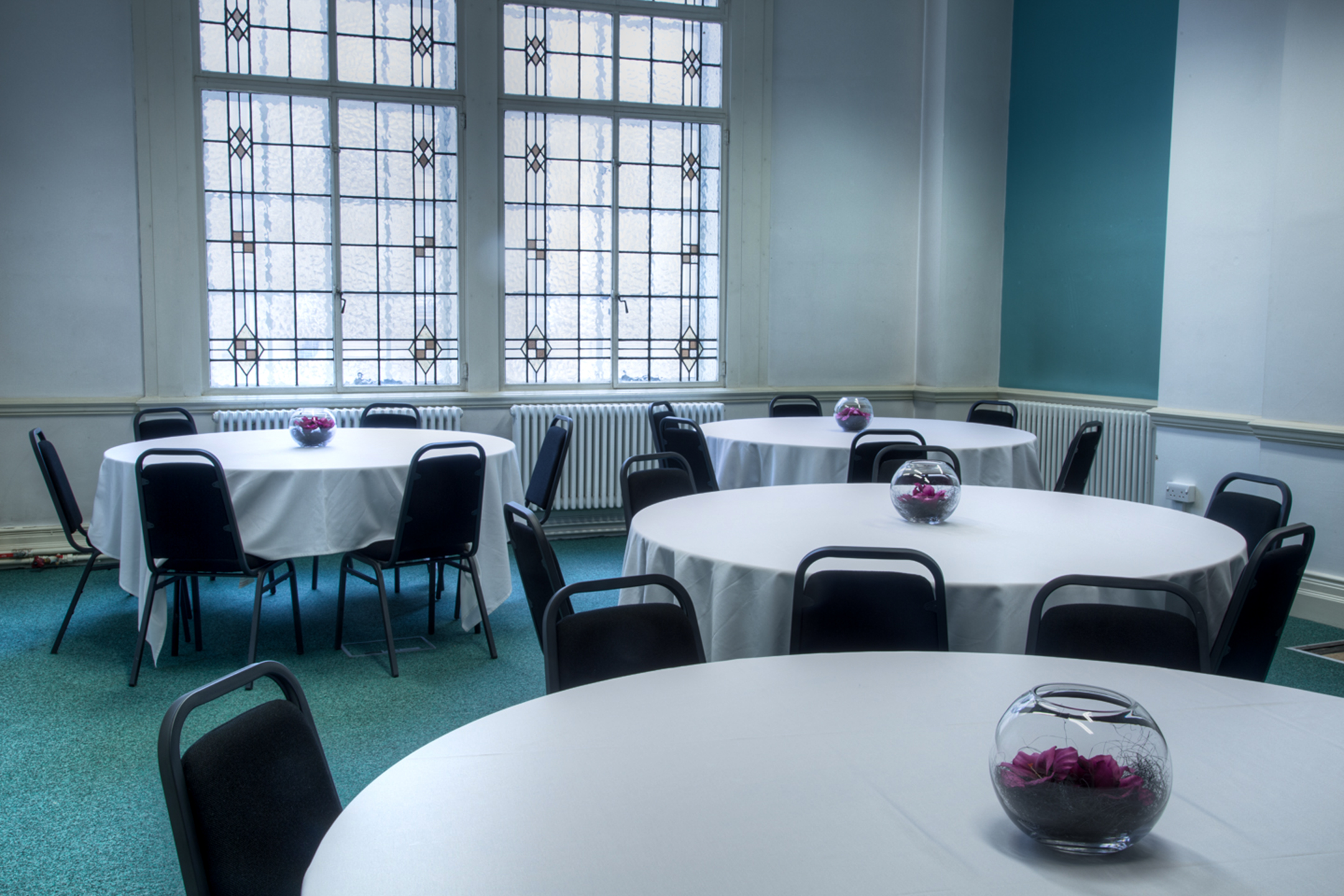 Robertshaw Room at Aspire Igen: bright, minimalist event space for meetings and gatherings.