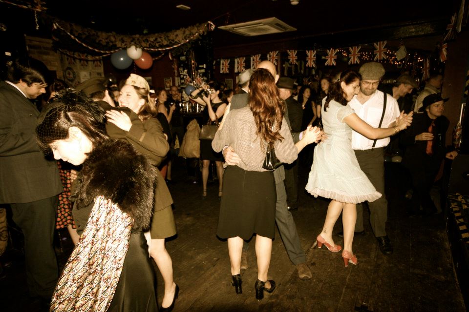 Lively event at The Boileroom with vintage attire and festive decor for memorable celebrations.