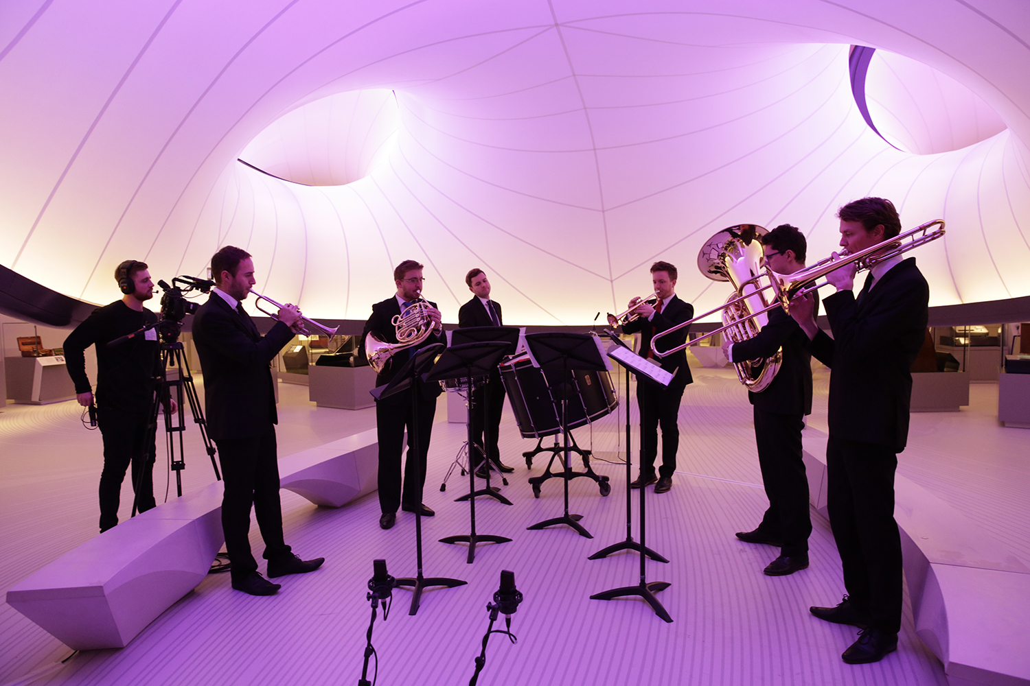 Sophisticated ensemble performing in elegant Winton Gallery, ideal for upscale events.