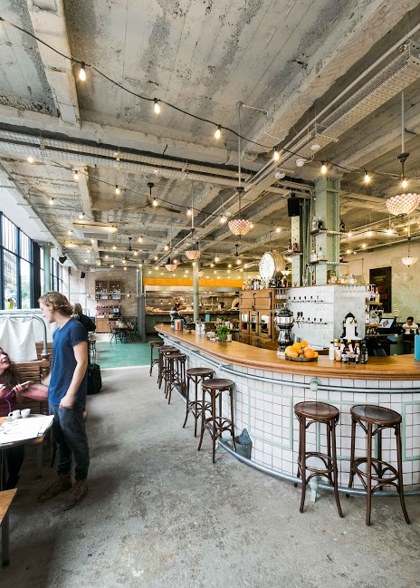 Vibrant Bitters Bar in Canova Hall, perfect for networking and informal meetings.