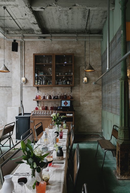 Bitters Bar in Canova Hall: modern venue with rustic decor for intimate gatherings and events.