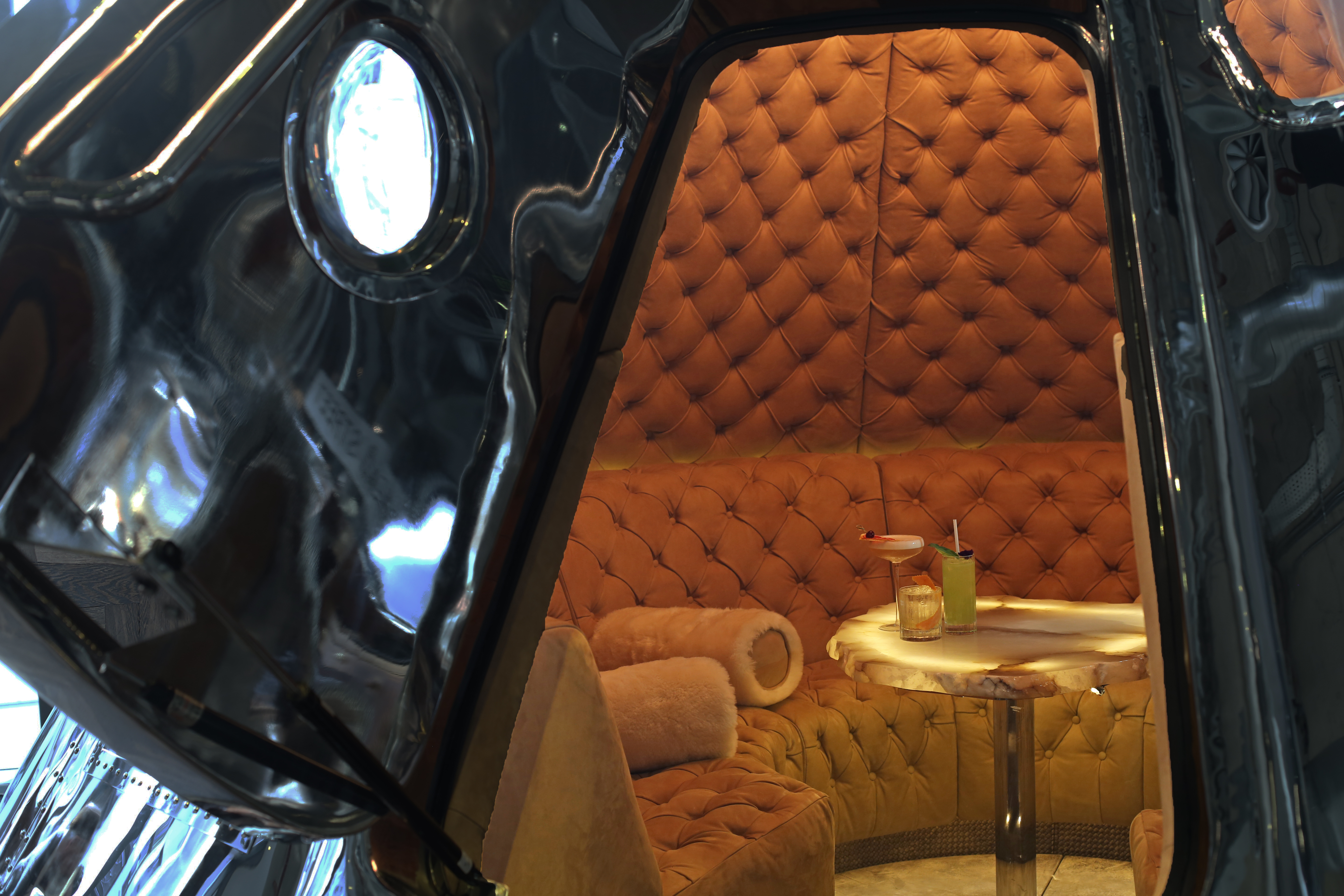 Stylish meeting space with plush seating at Bread Street Kitchen, ideal for workshops.