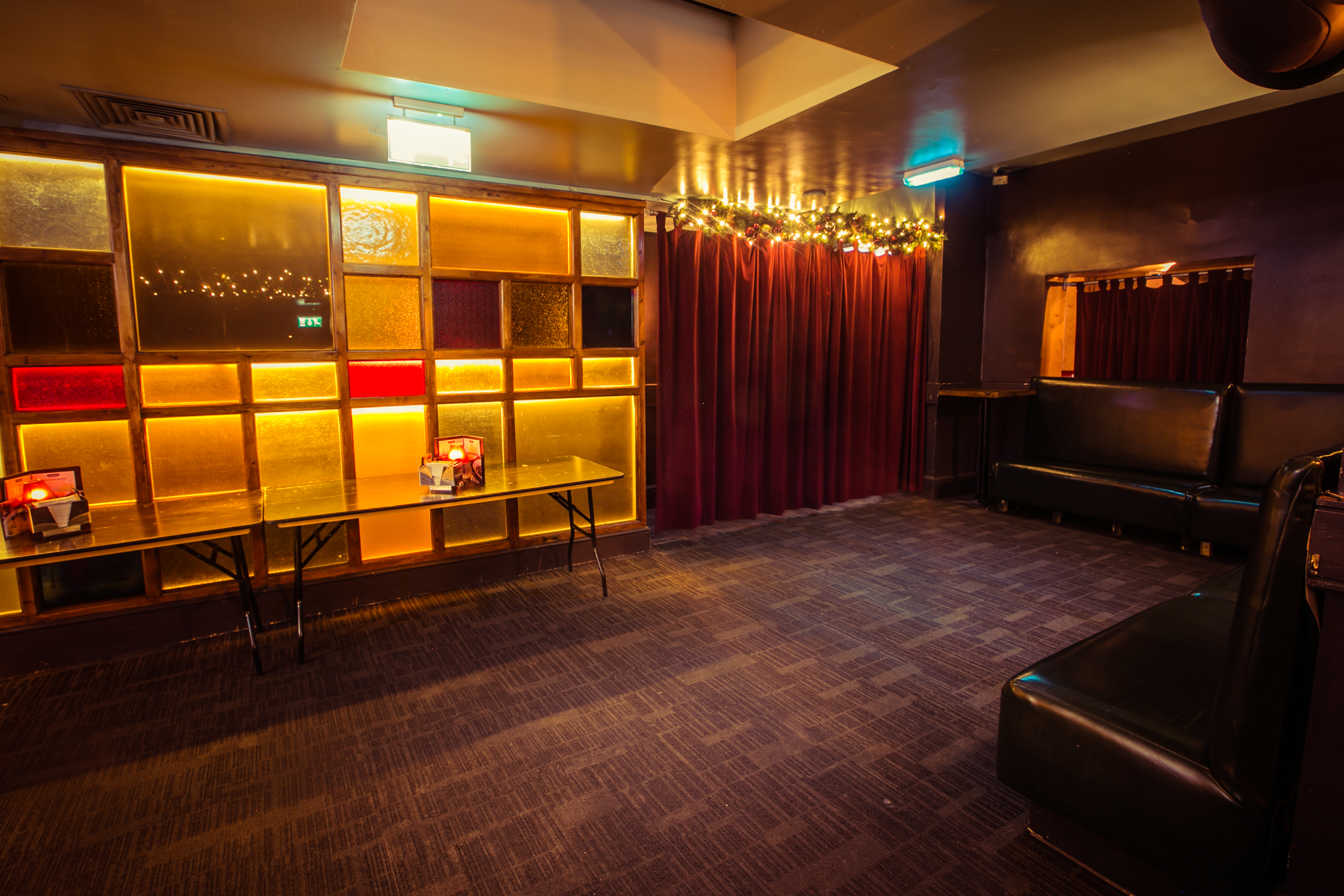 Cozy event space at The Party Bar, ideal for gatherings and meetings in Farringdon.