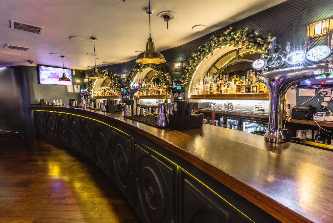 Stylish bar setup at The Piano Works West End for networking events and social gatherings.