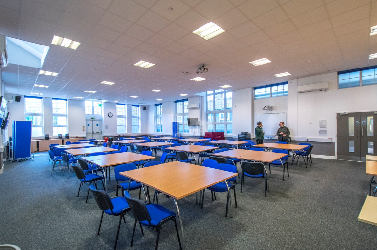 Main Hall in Professional Development Centre, bright meeting space for workshops and events.