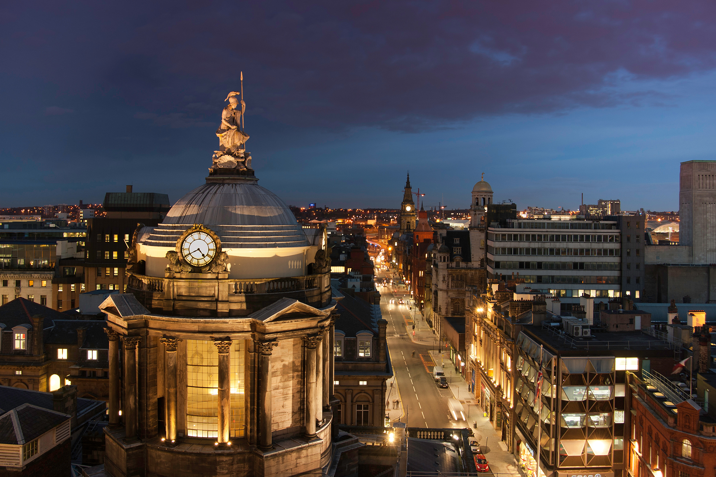 Liverpool Town Hall Main Ballroom at dusk, featuring a clock tower for gala events.