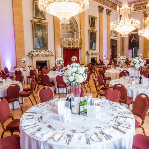 Elegant Liverpool Town Hall ballroom with floral centerpieces for weddings and corporate events.