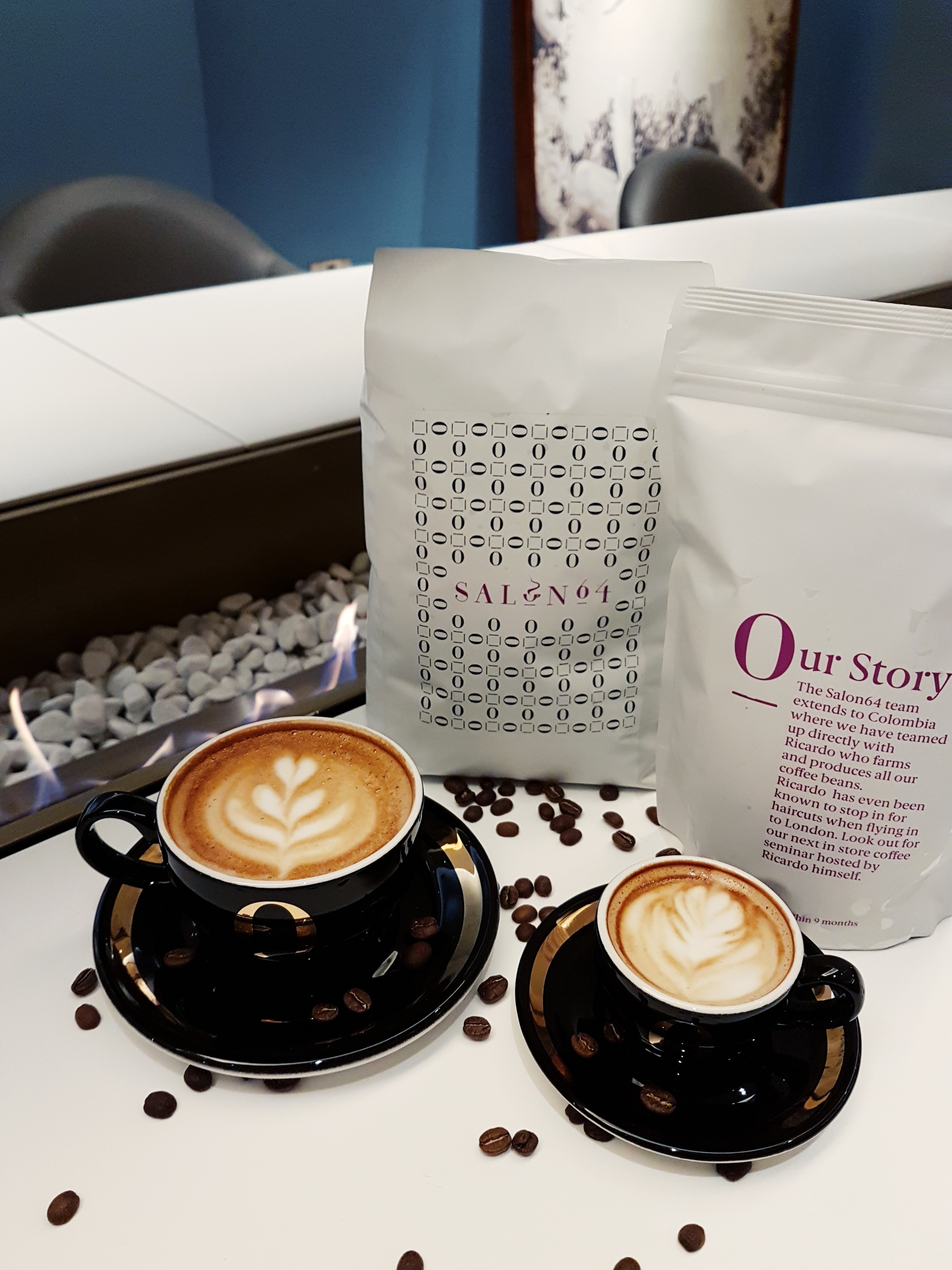 Stylish coffee setup with latte art at SALON64 for upscale events and networking.