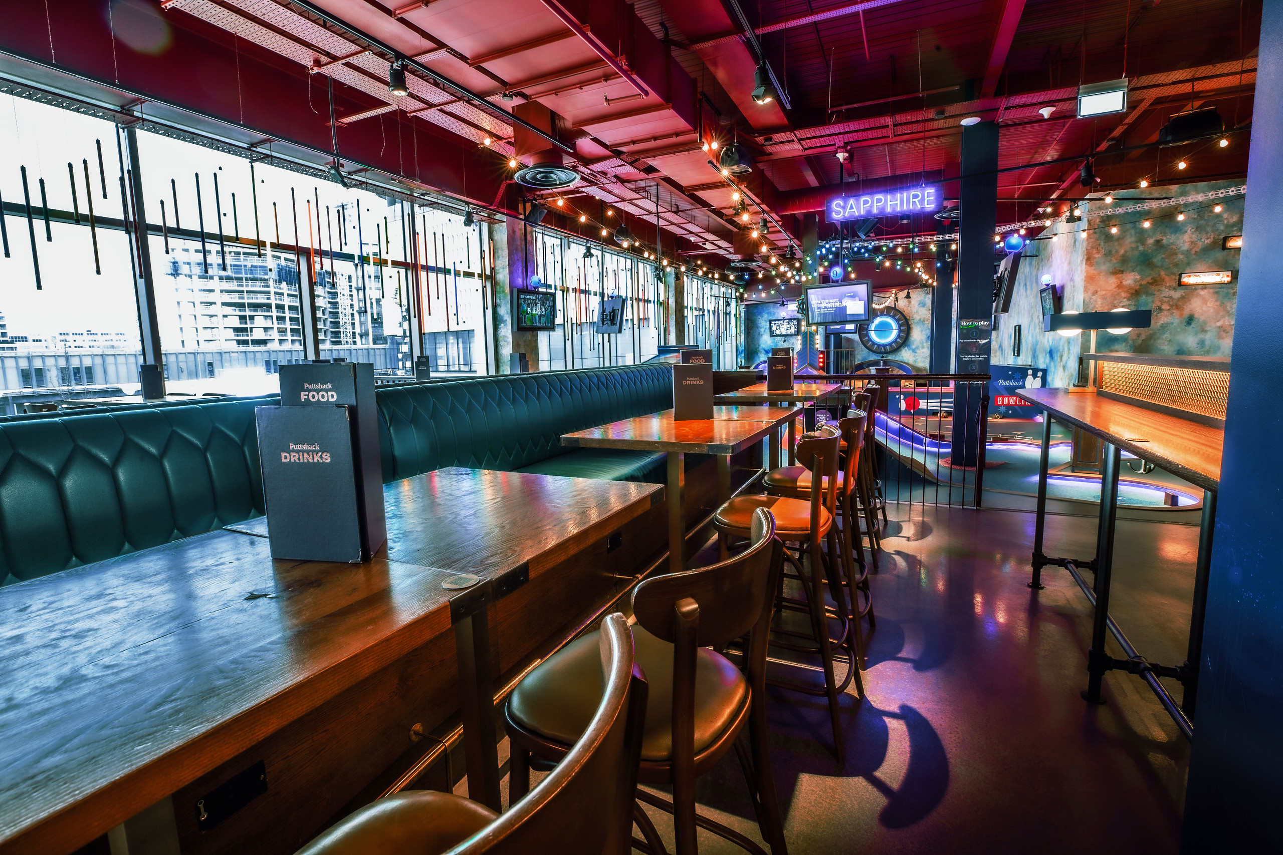 Sapphire Area at Puttshack White City, modern event space for networking and gatherings.