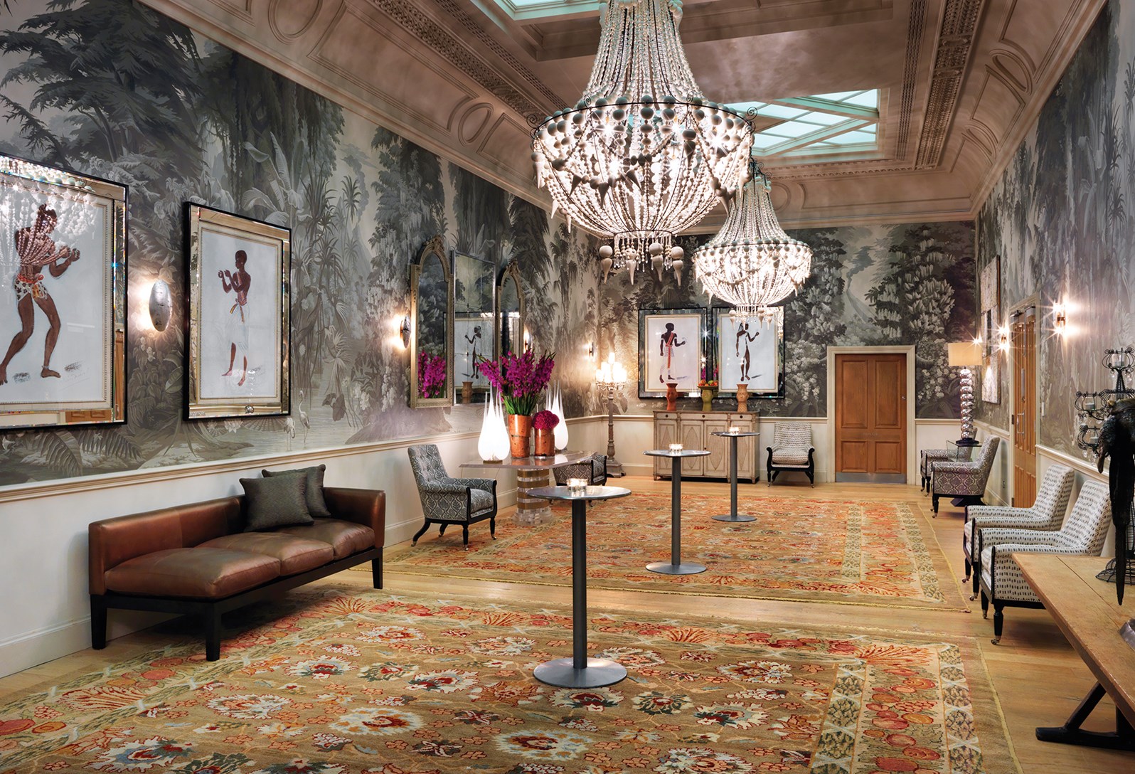 Elegant event space with high ceilings at Haymarket Hotel for upscale receptions.