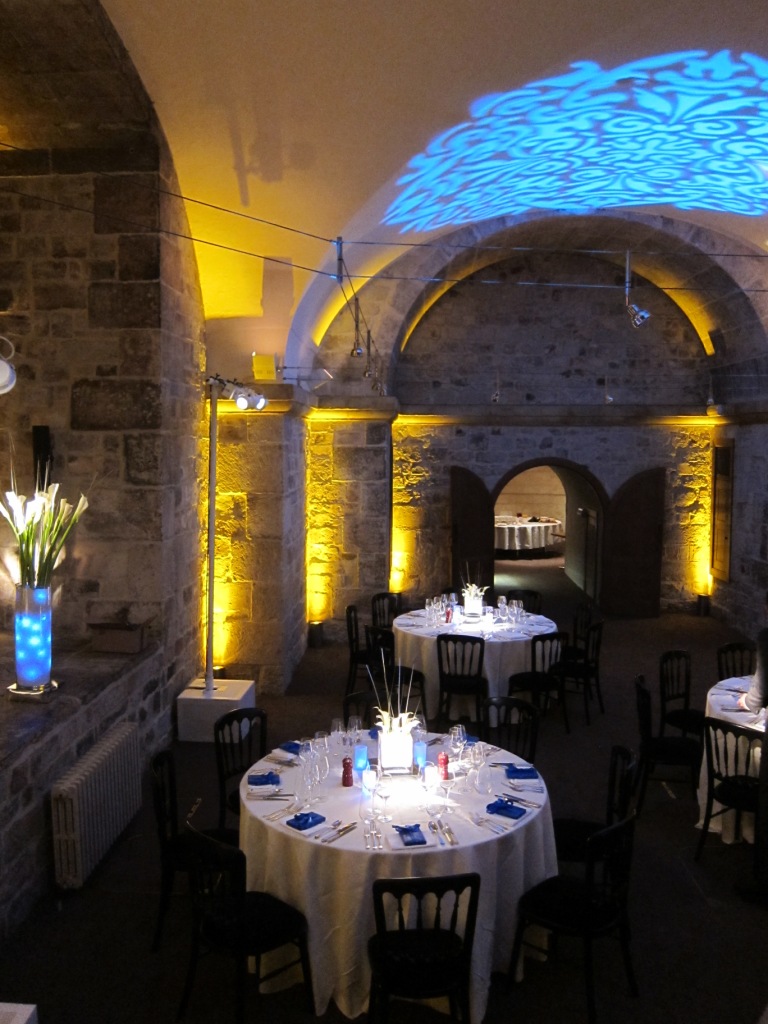 Wren Suite in St. Paul's Cathedral, elegant event space with round tables for gatherings.