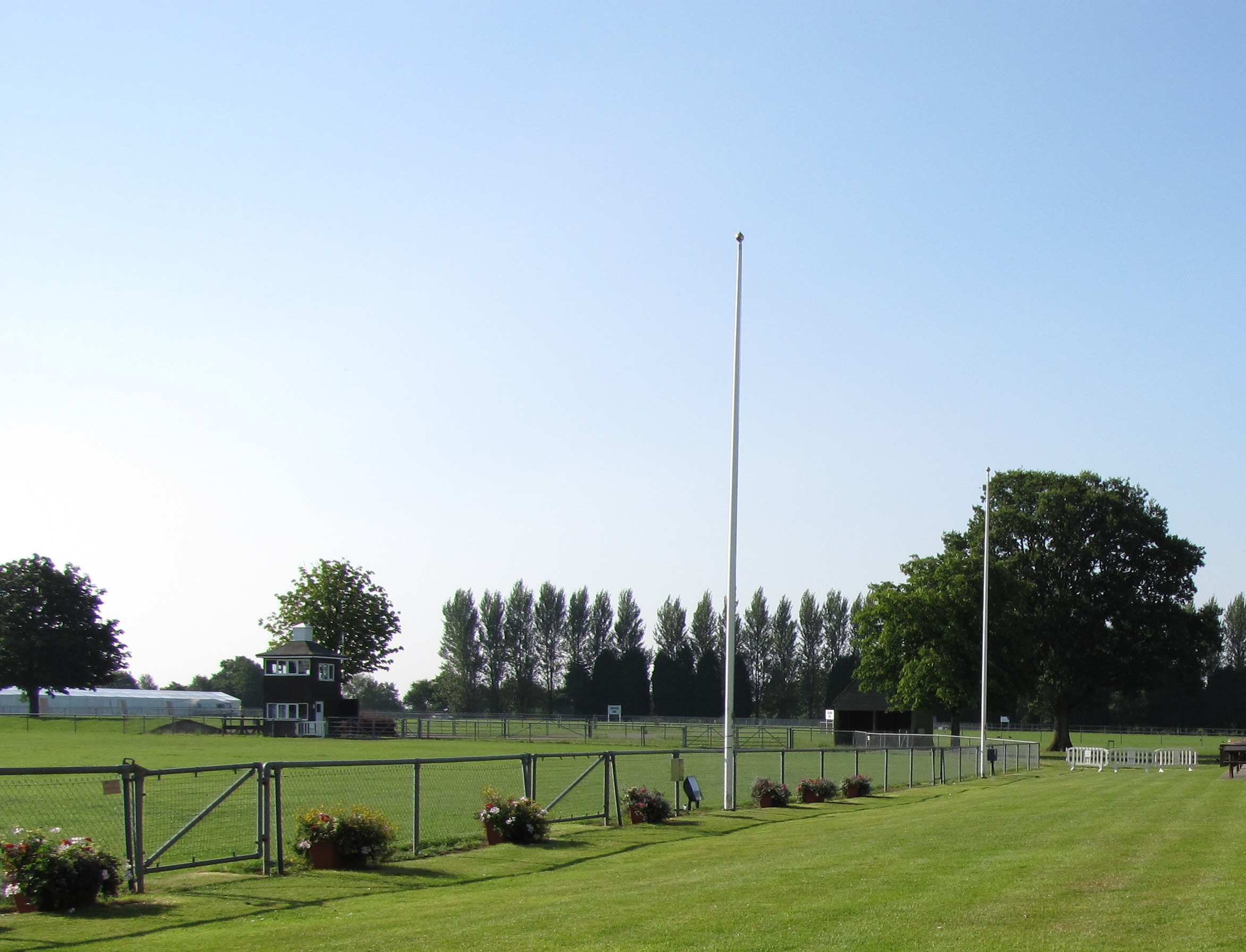 Spacious outdoor venue with green lawns for events in South of England Event Centre.