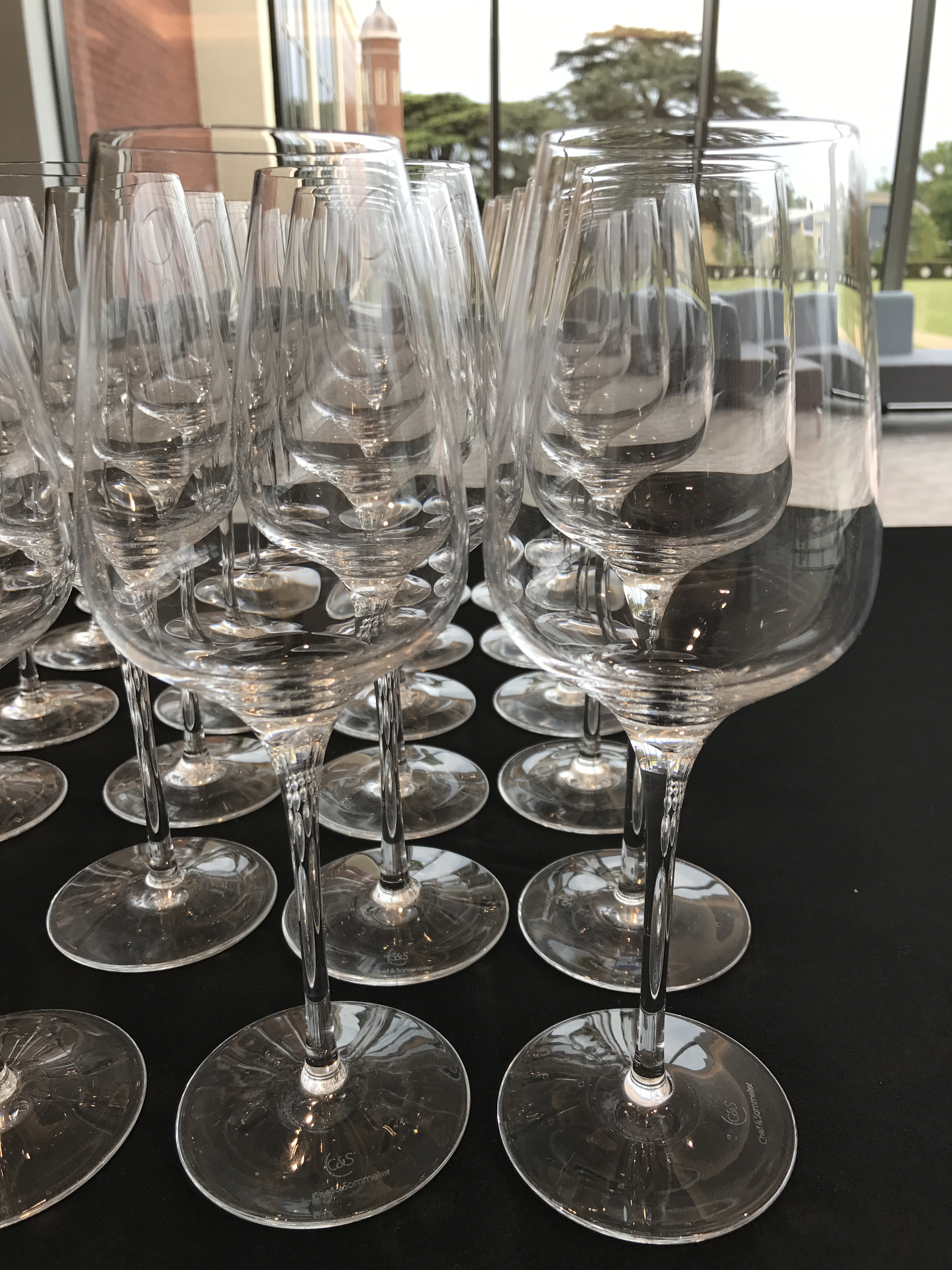 Elegant wine glasses display at King’s Hedges, perfect for sophisticated events.