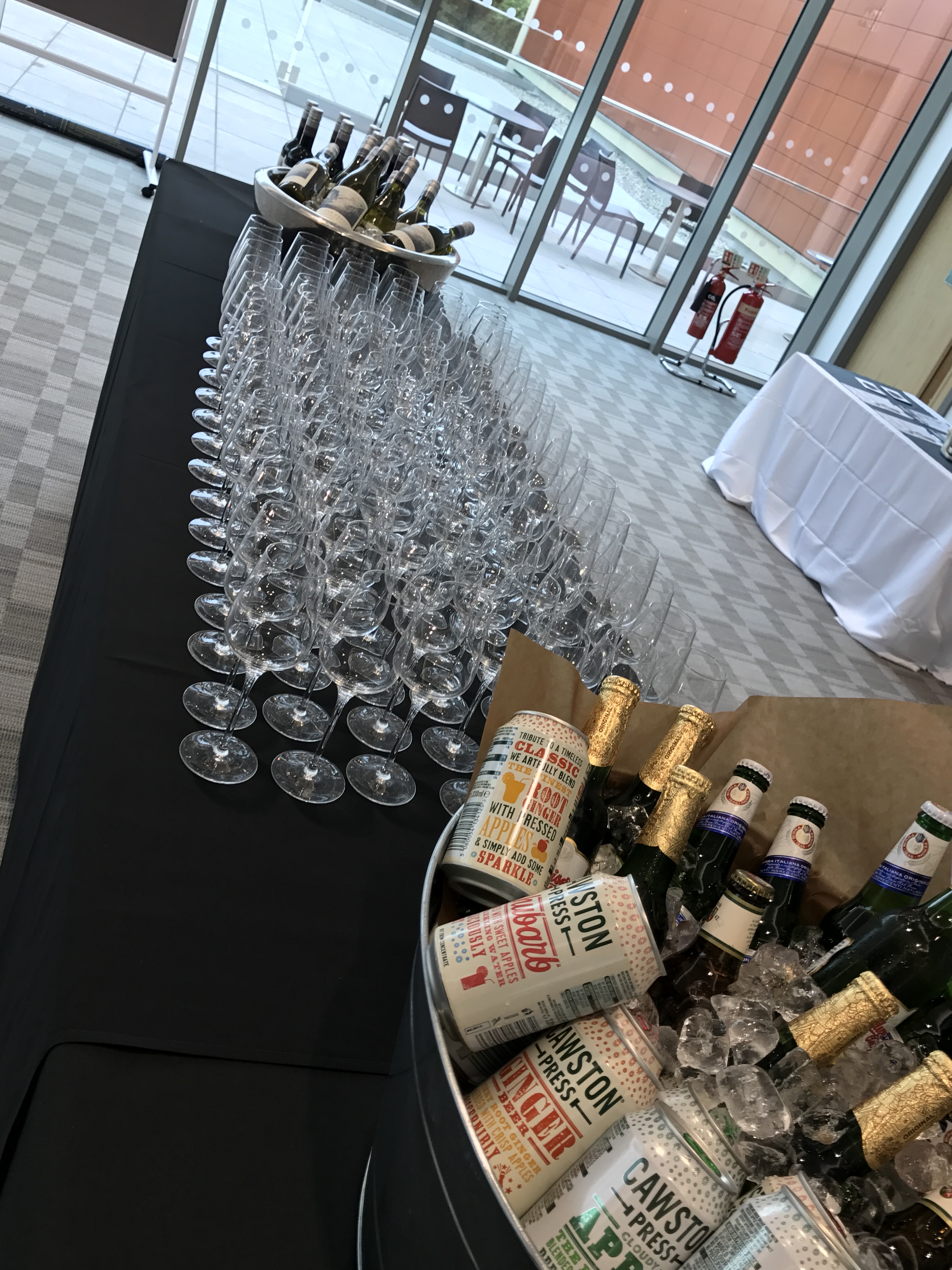 Elegant sparkling wine glasses in Queen Edith's for a sophisticated event.