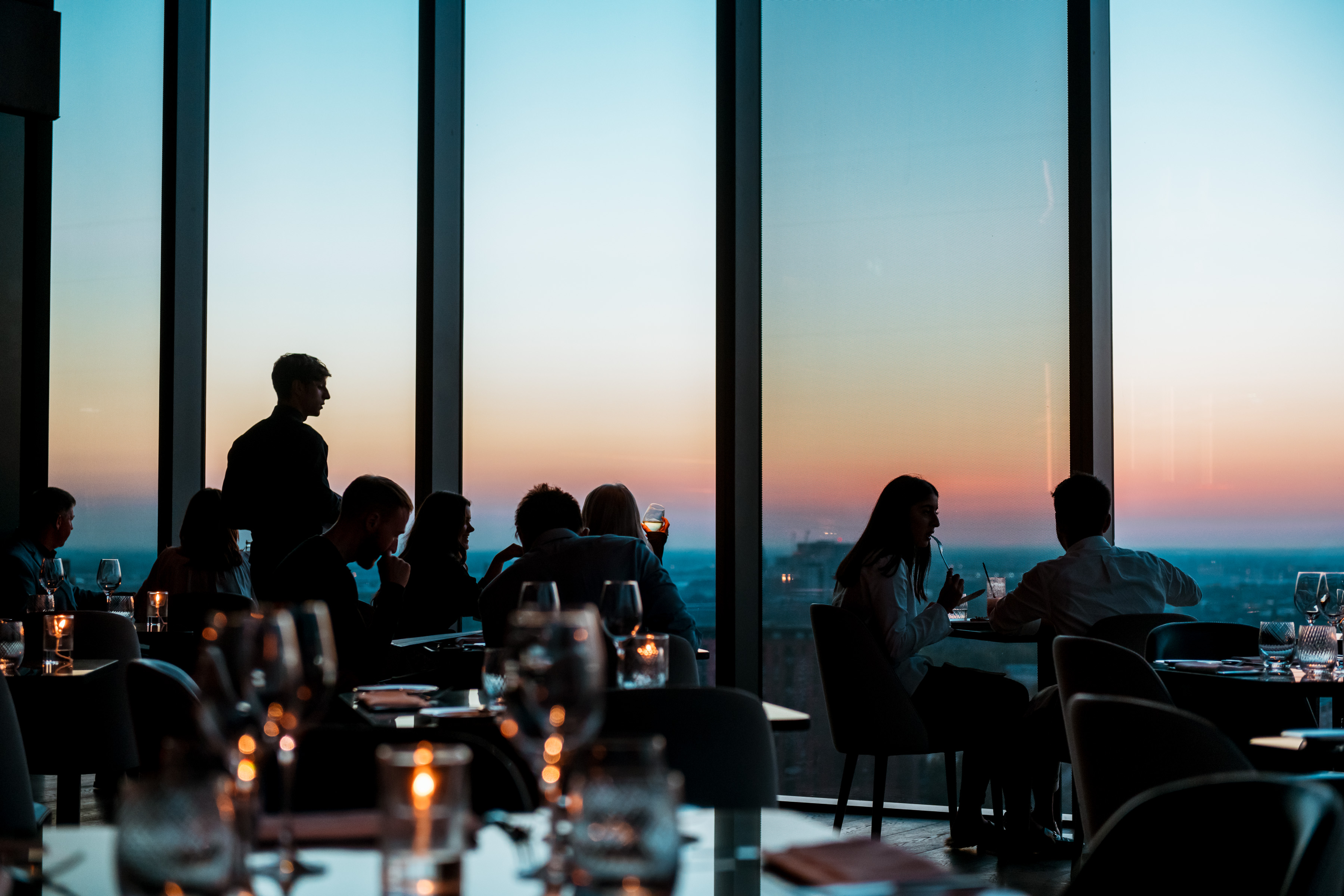 Sophisticated event space with sunset view at 20 Stories Restaurant for networking gatherings.