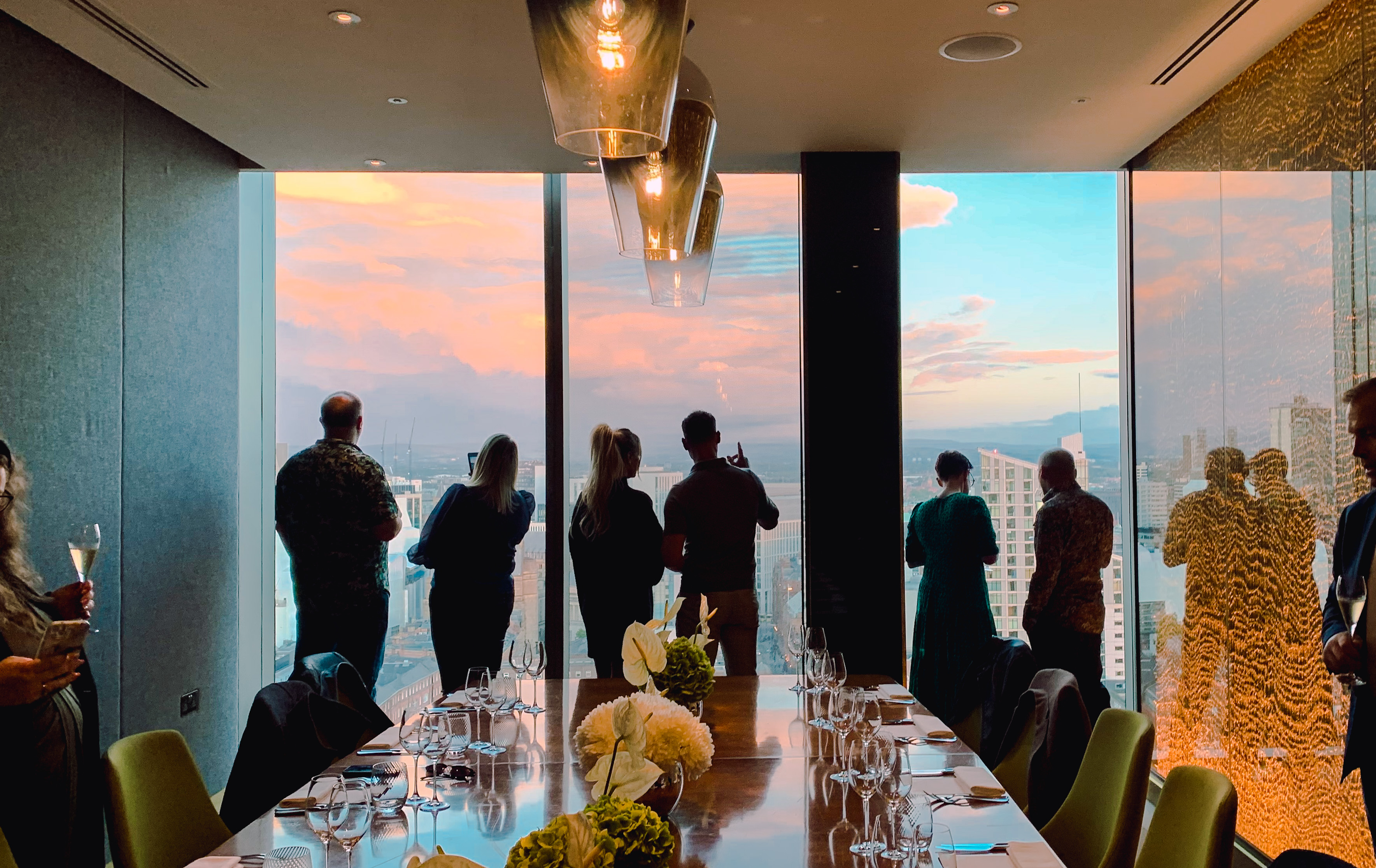 Sophisticated event space with skyline view for high-end meetings and private gatherings.