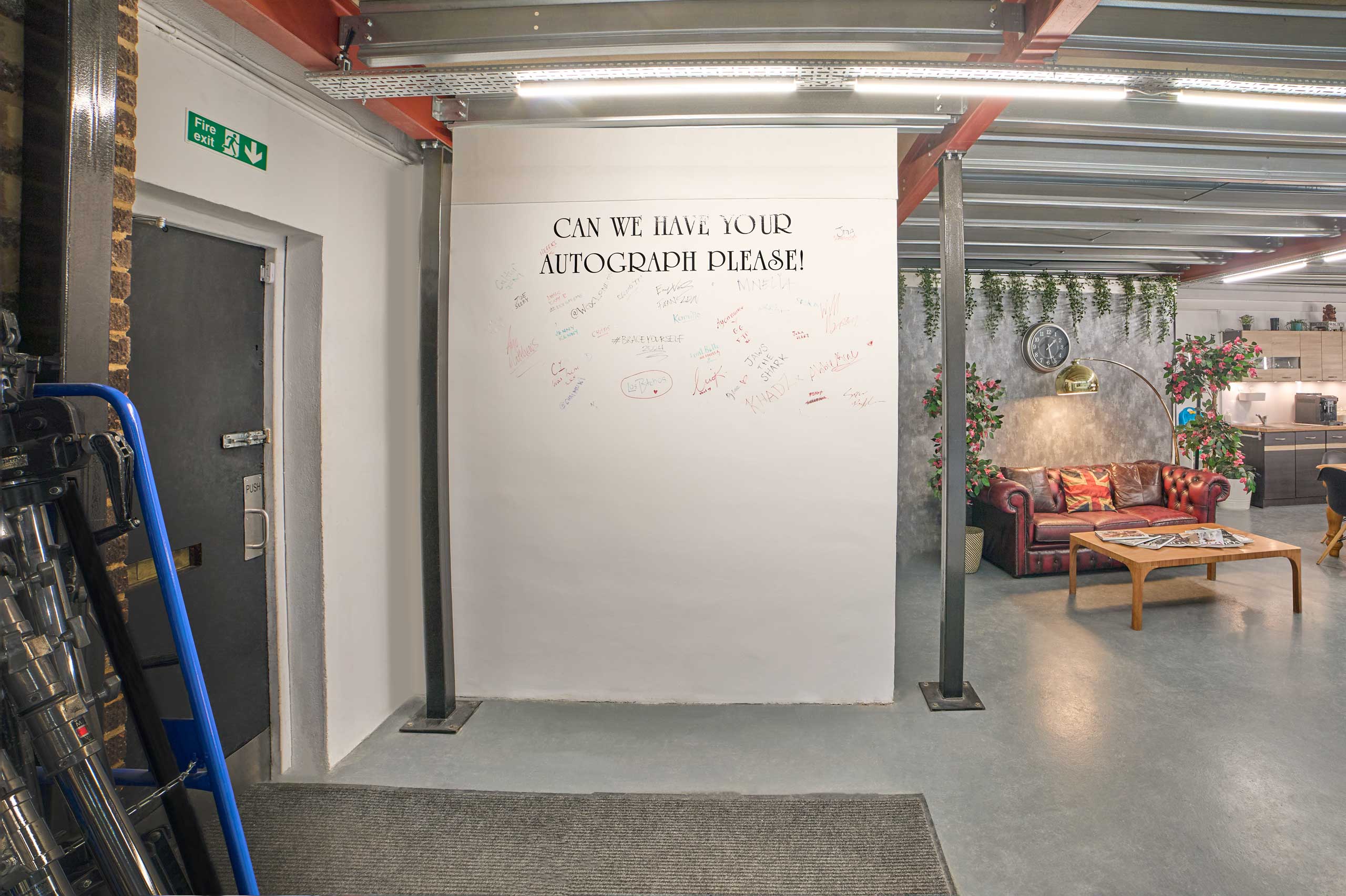 Cineview Studios event space with lounge area and interactive autograph wall in London.