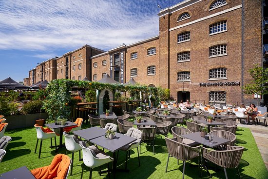 Vibrant outdoor event space at The Sipping Room, ideal for gatherings and networking.