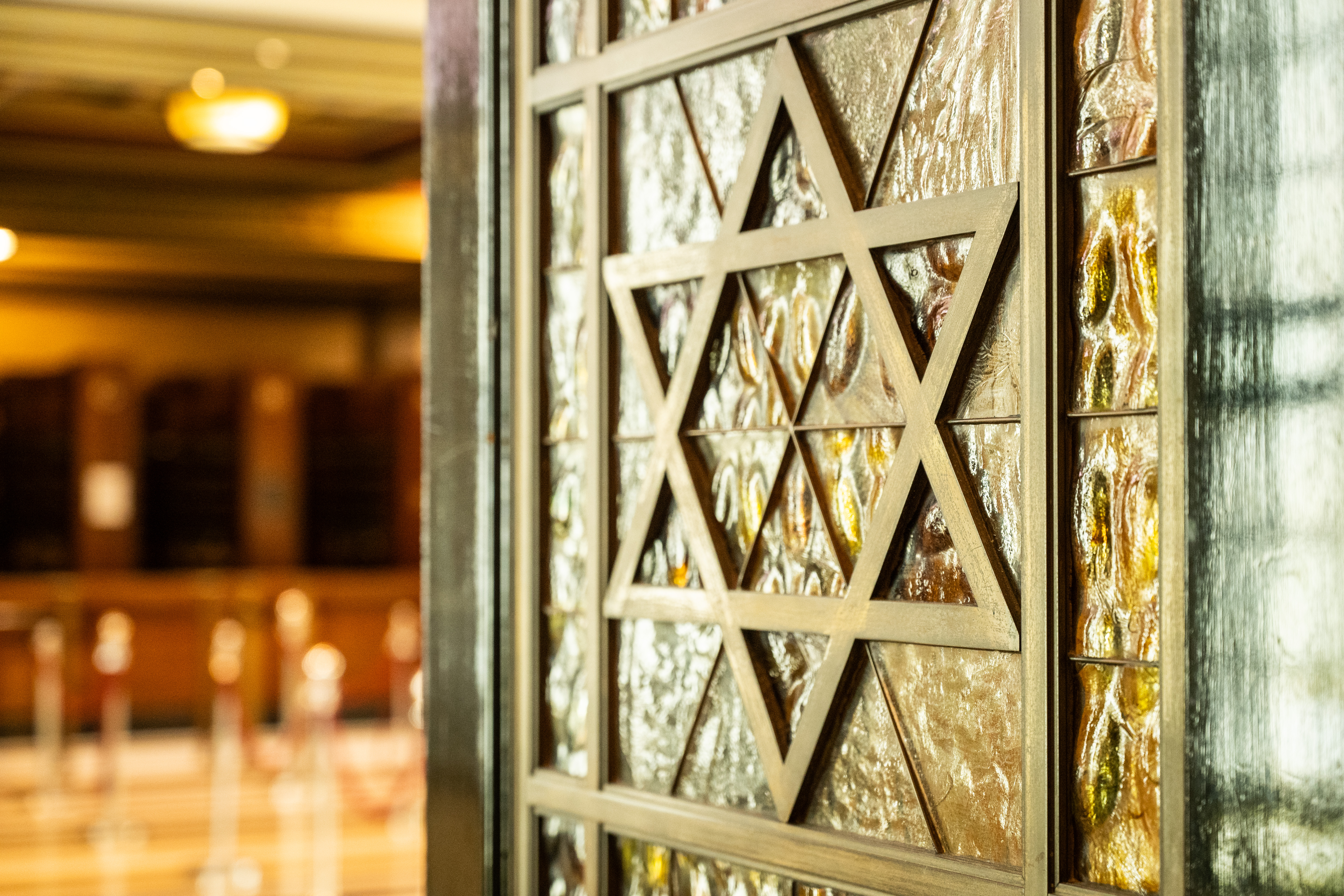 Stained glass Star of David at Tower Doors & Foyer, ideal for heritage events.