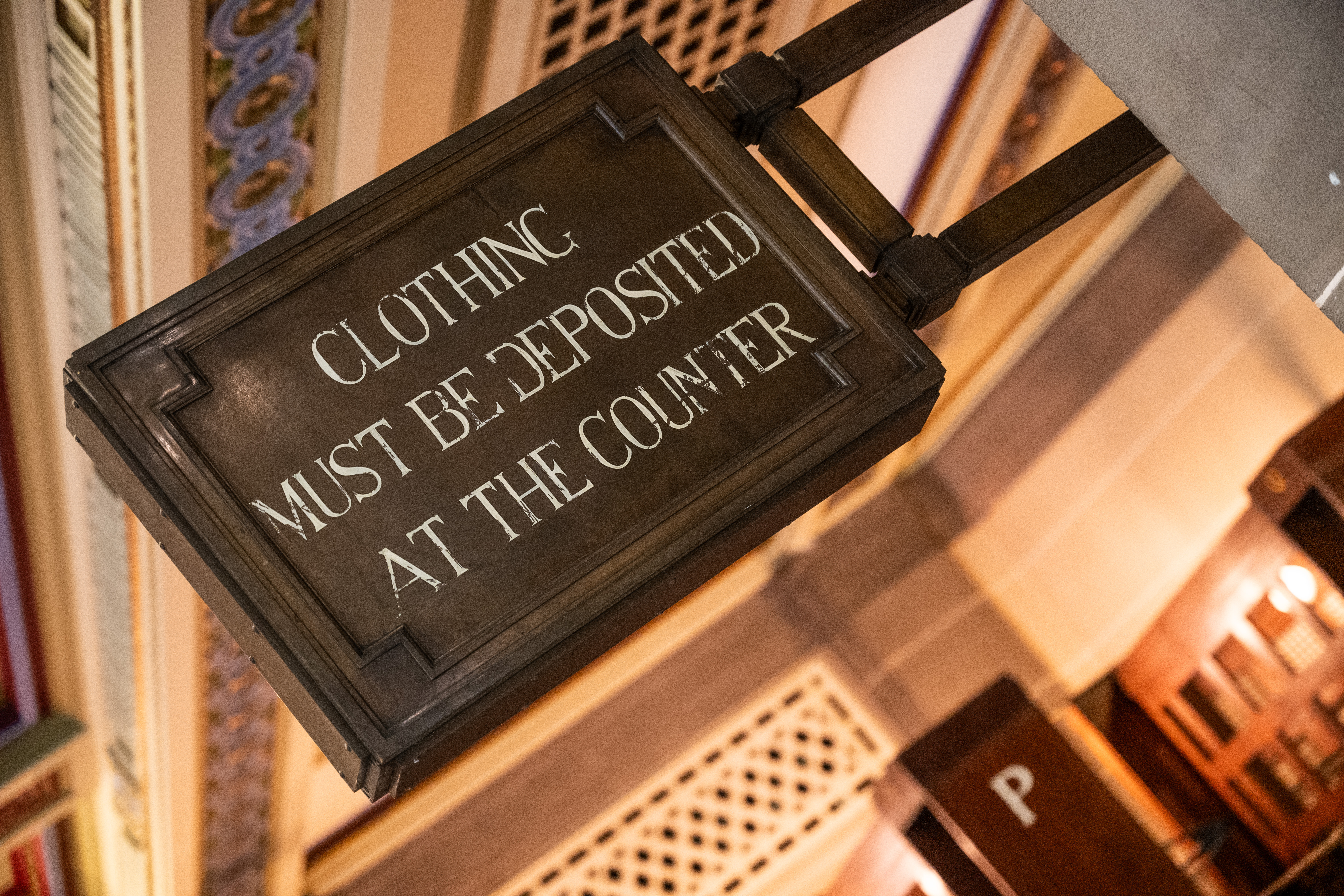 Vintage sign at Tower Doors & Foyer, 60 Great Queen Street, enhancing event organization.
