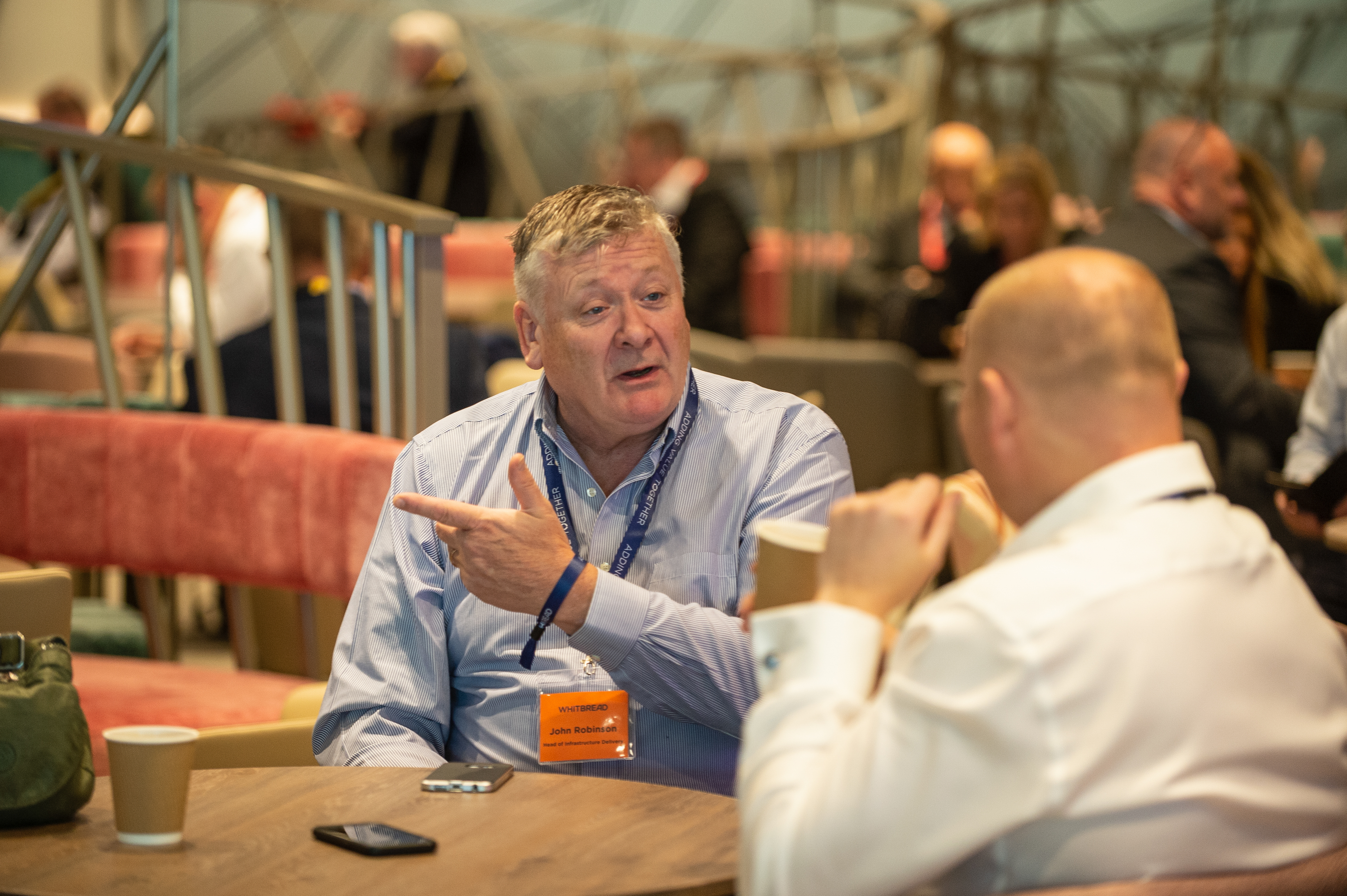 Networking event in The Atrium, Wembley Stadium with comfortable seating and collaboration.