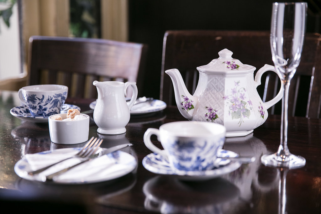 Elegant tea service setup with fine china in Irish Whisky Vault, Covent Garden.