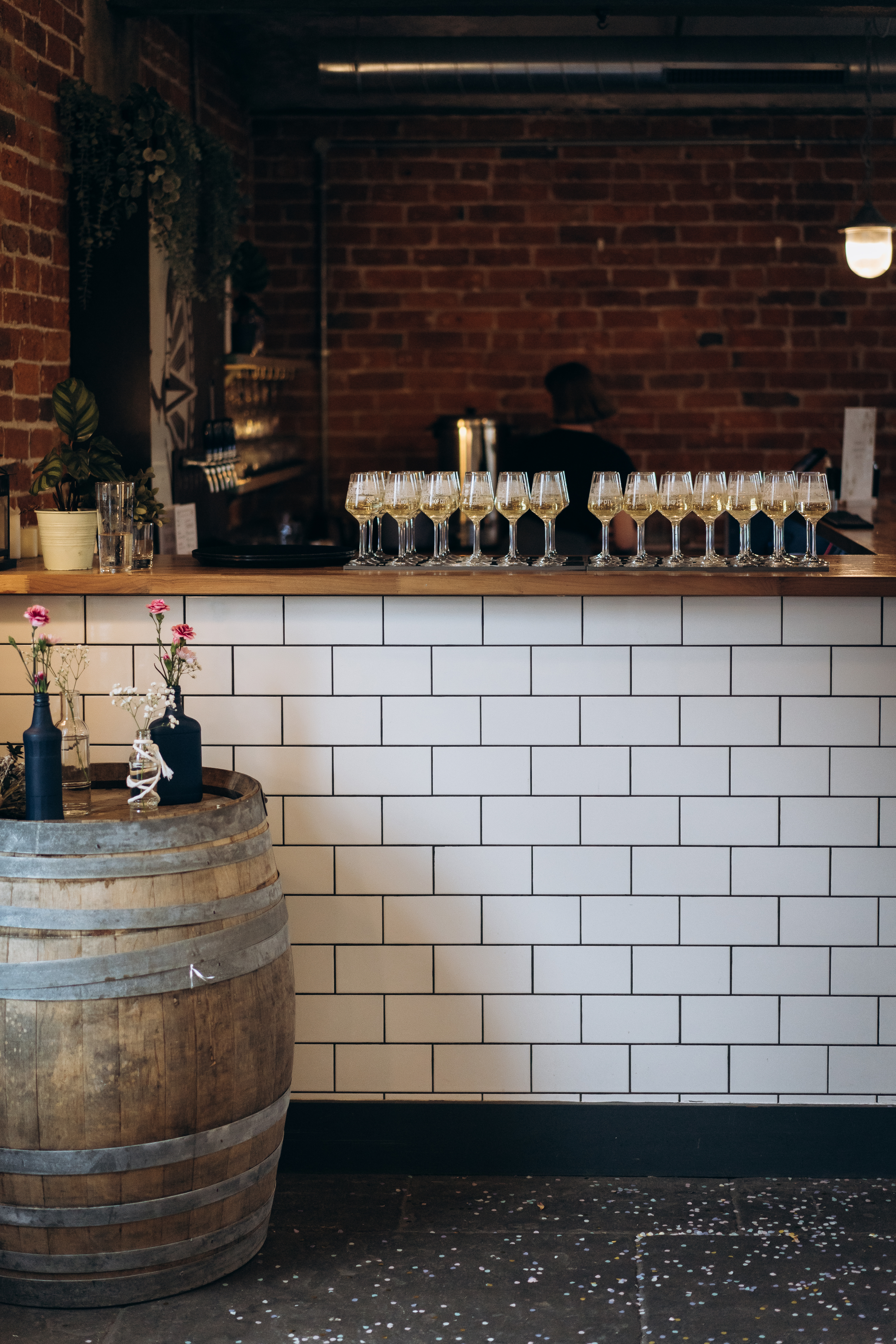 Stylish bar setup with elegant glasses in The Chapter Hall for events and receptions.