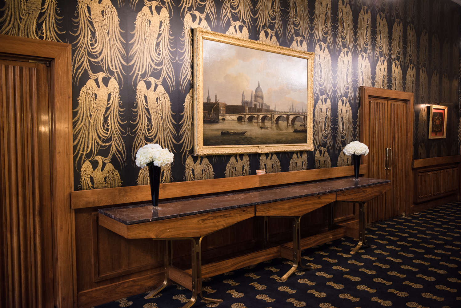 Elegant event space at The Charter Gallery with floral arrangements for receptions.