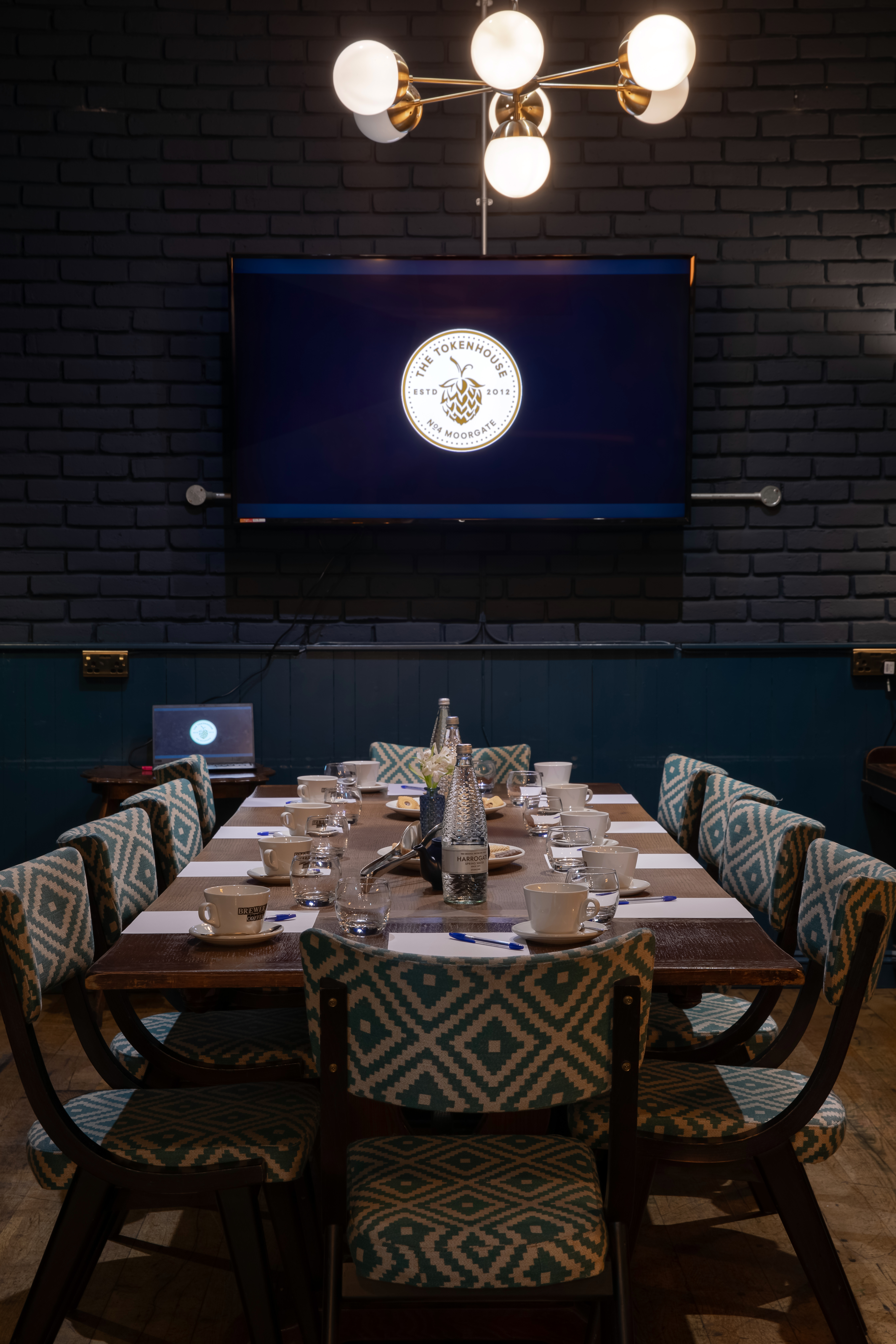 Meeting room at The Tokenhouse with long table, ideal for presentations and events.