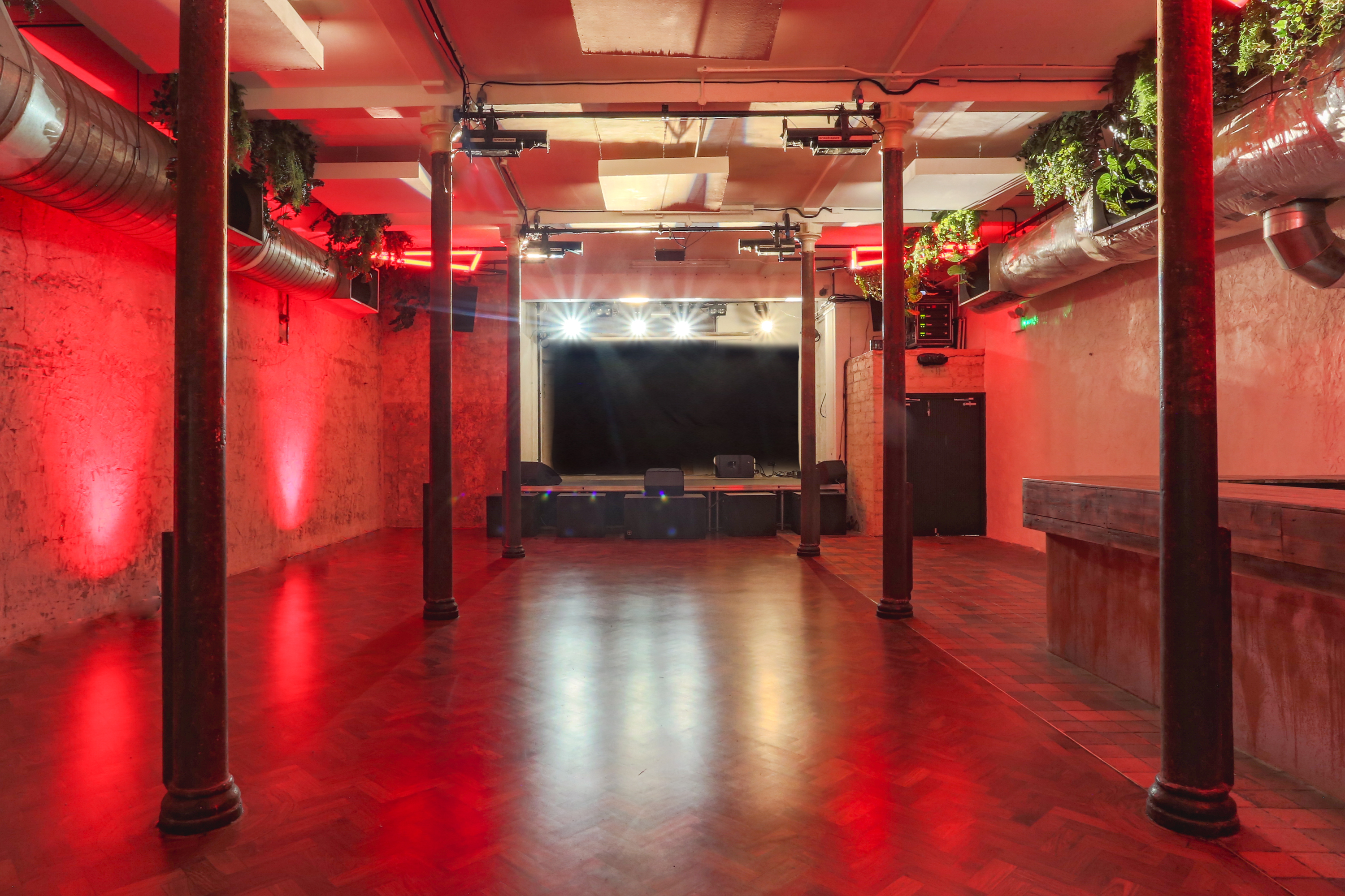 Live Room at 93 Feet East: industrial event space with polished floor for corporate and social events.